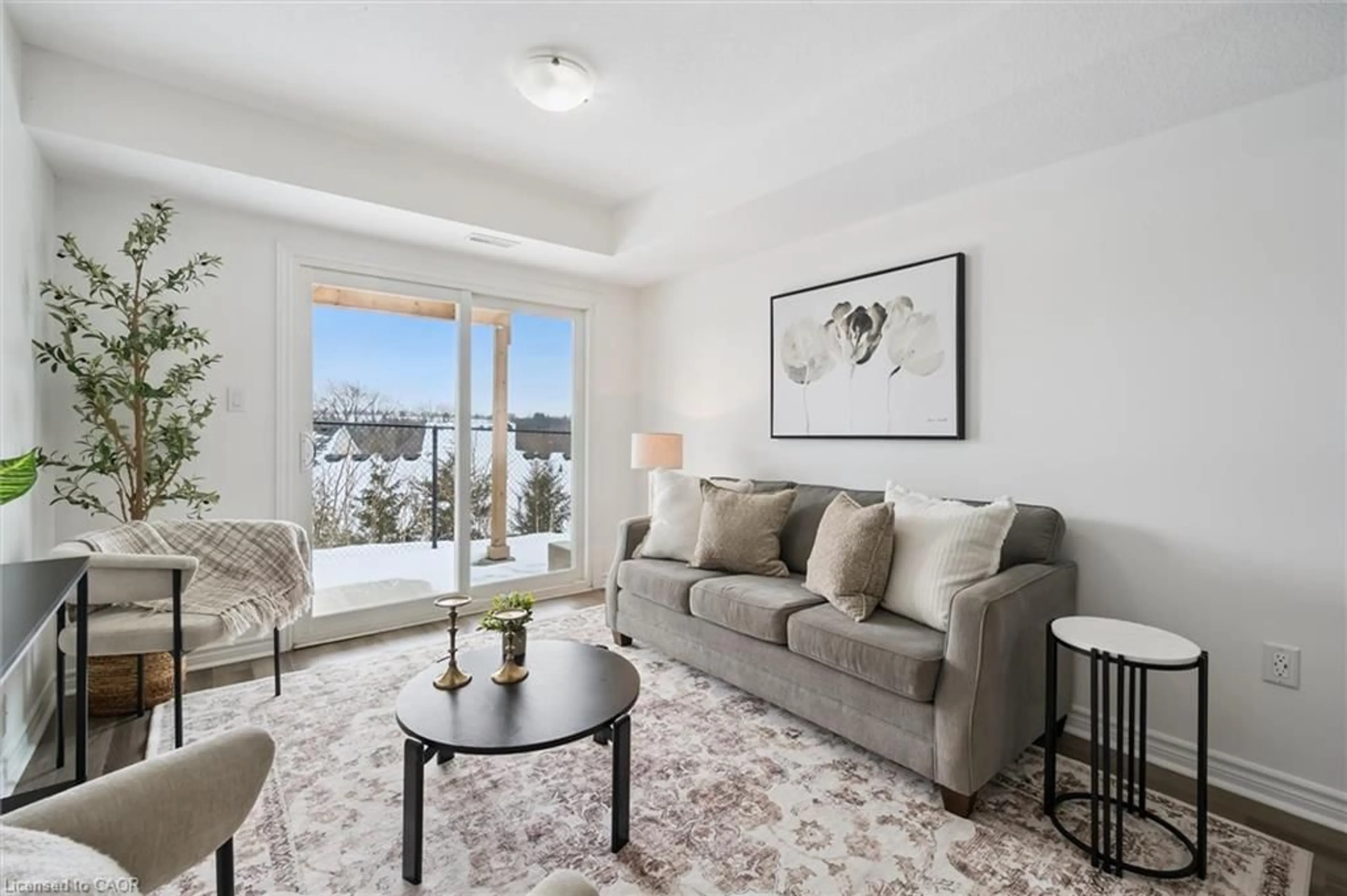 Living room with furniture, unknown for 5 Cityview Dr #103, Guelph Ontario N1E 0R1