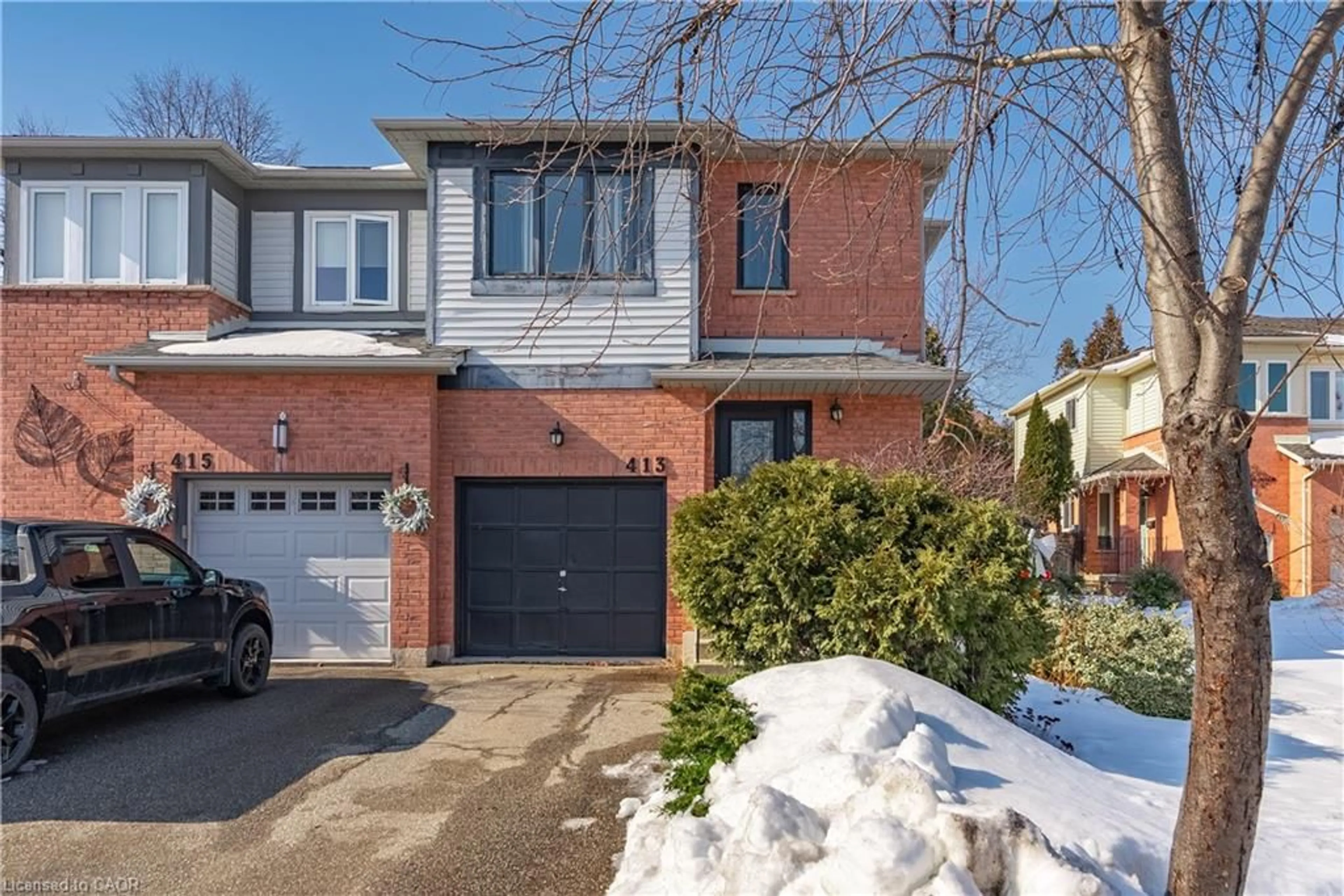 Home with brick exterior material, street for 413 Levanna Lane, Oakville Ontario L6H 6B8