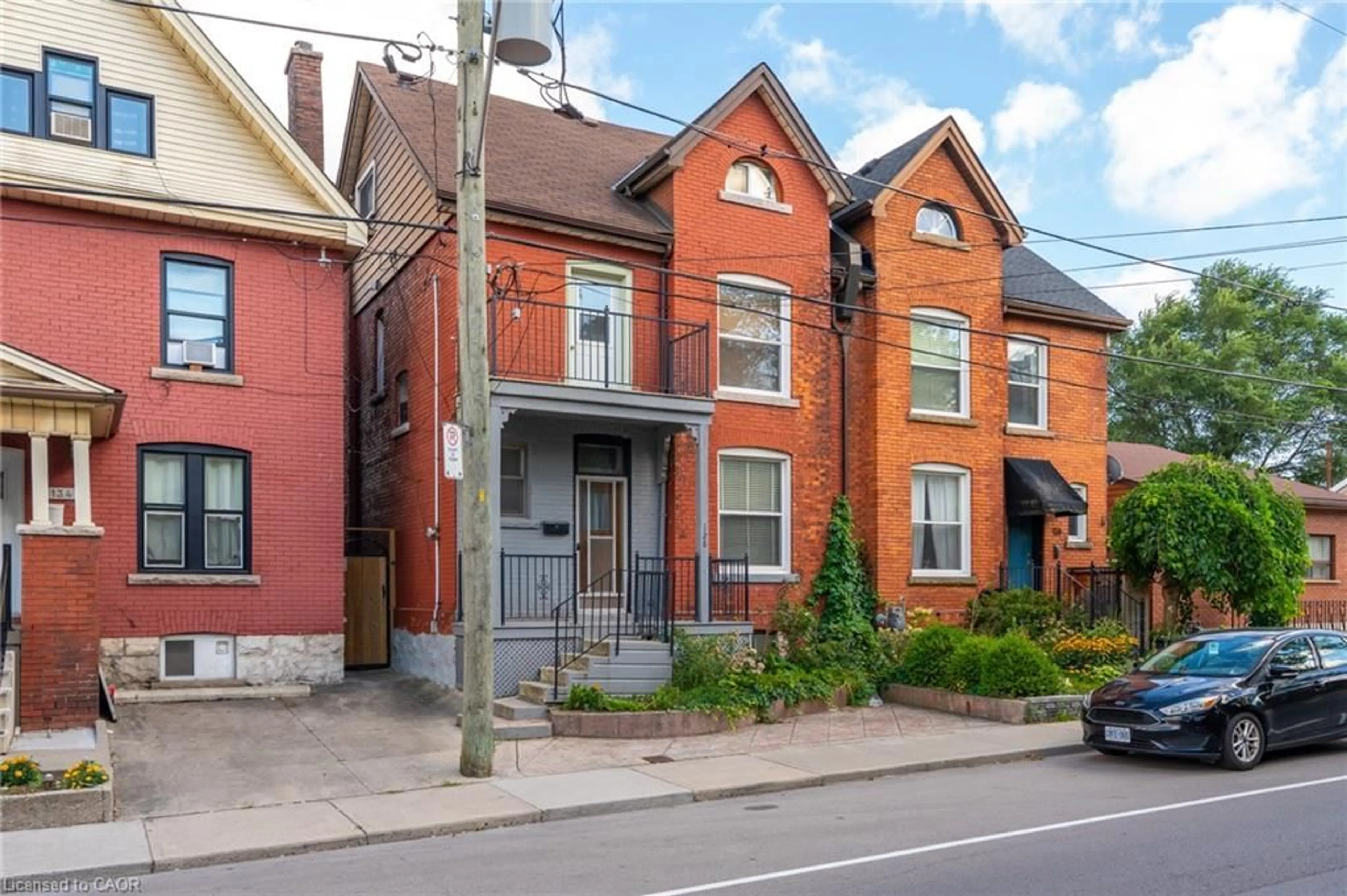 Home with brick exterior material, street for 128 Hess St, Hamilton Ontario L8R 2T2