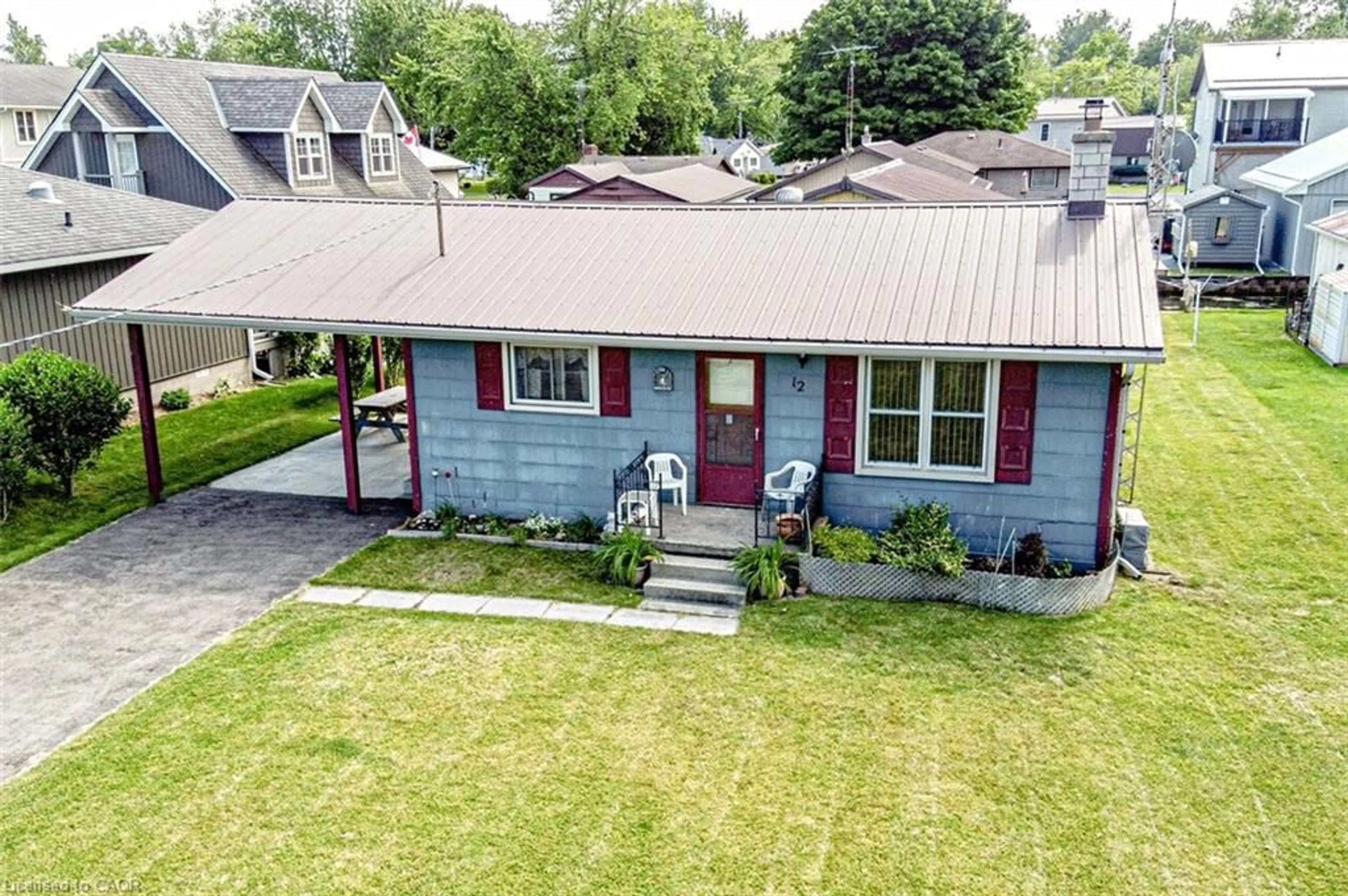 A pic from outside/outdoor area/front of a property/back of a property/a pic from drone, street for 12 Willow Ave, Long Point Ontario N0E 1M0