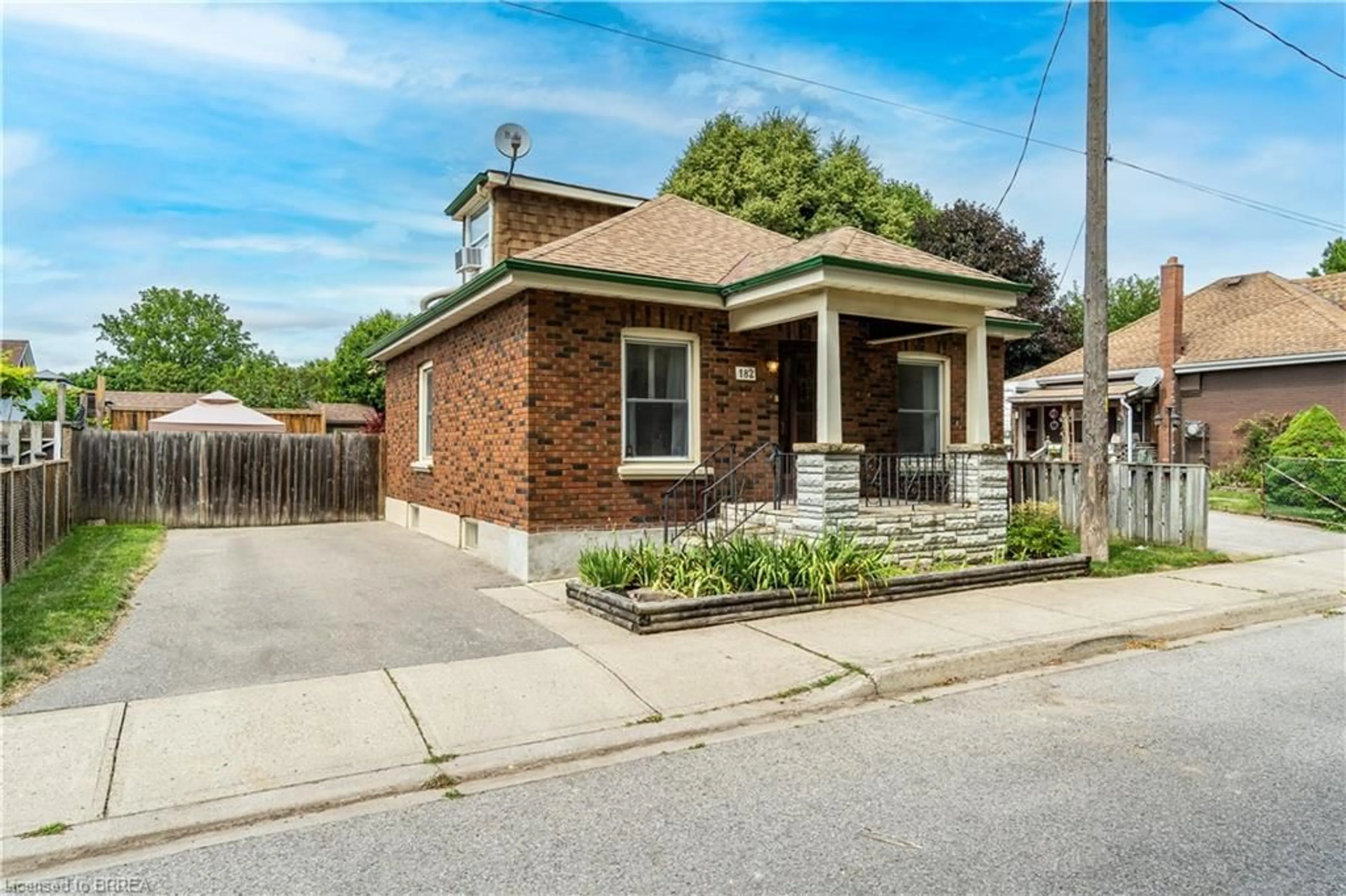 Home with brick exterior material, street for 182 Durham St, Brantford Ontario N3S 4Y7