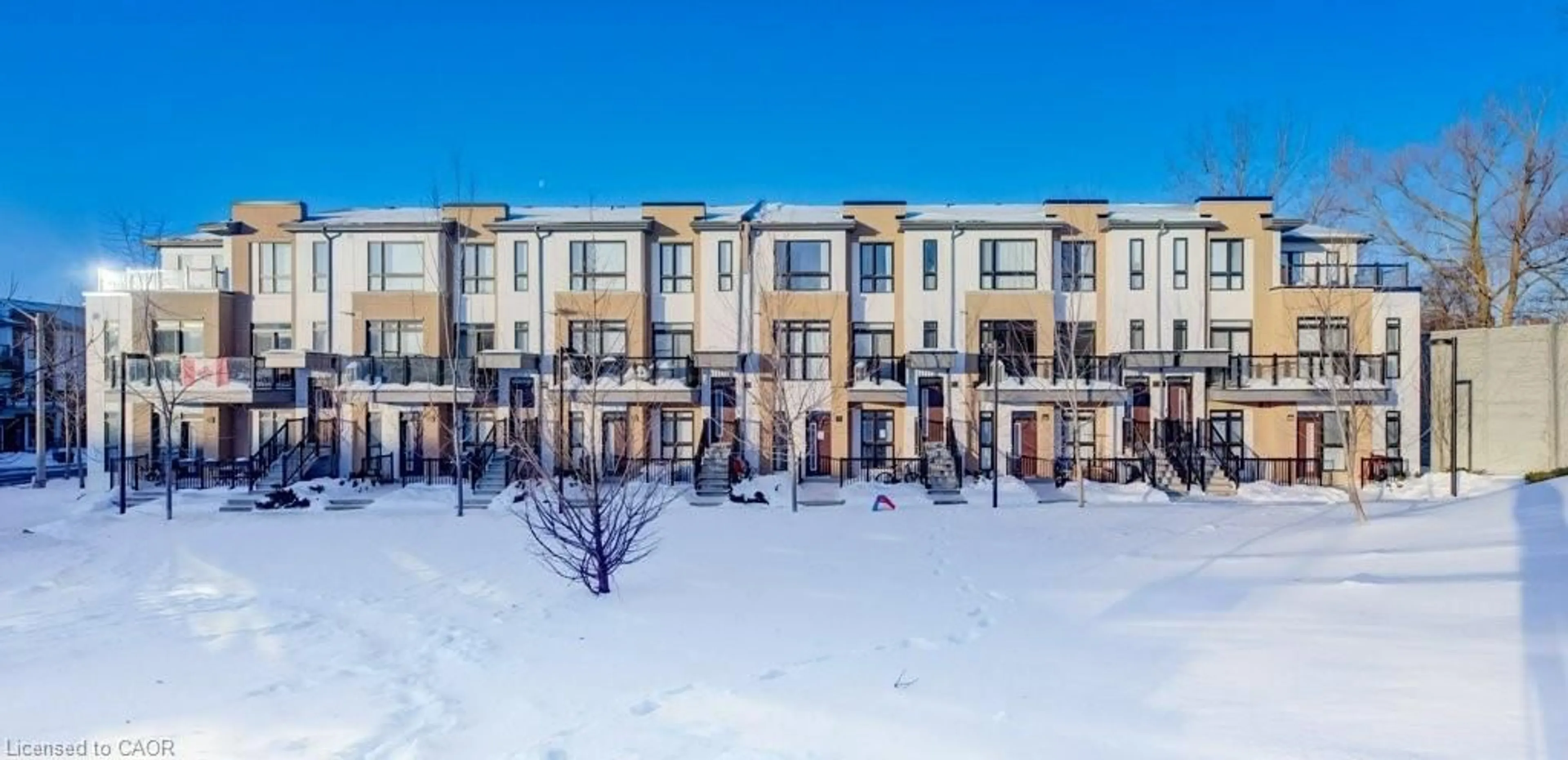 A pic from outside/outdoor area/front of a property/back of a property/a pic from drone, street for 90 Canon Jackson Dr #103, Toronto Ontario M6M 0C1