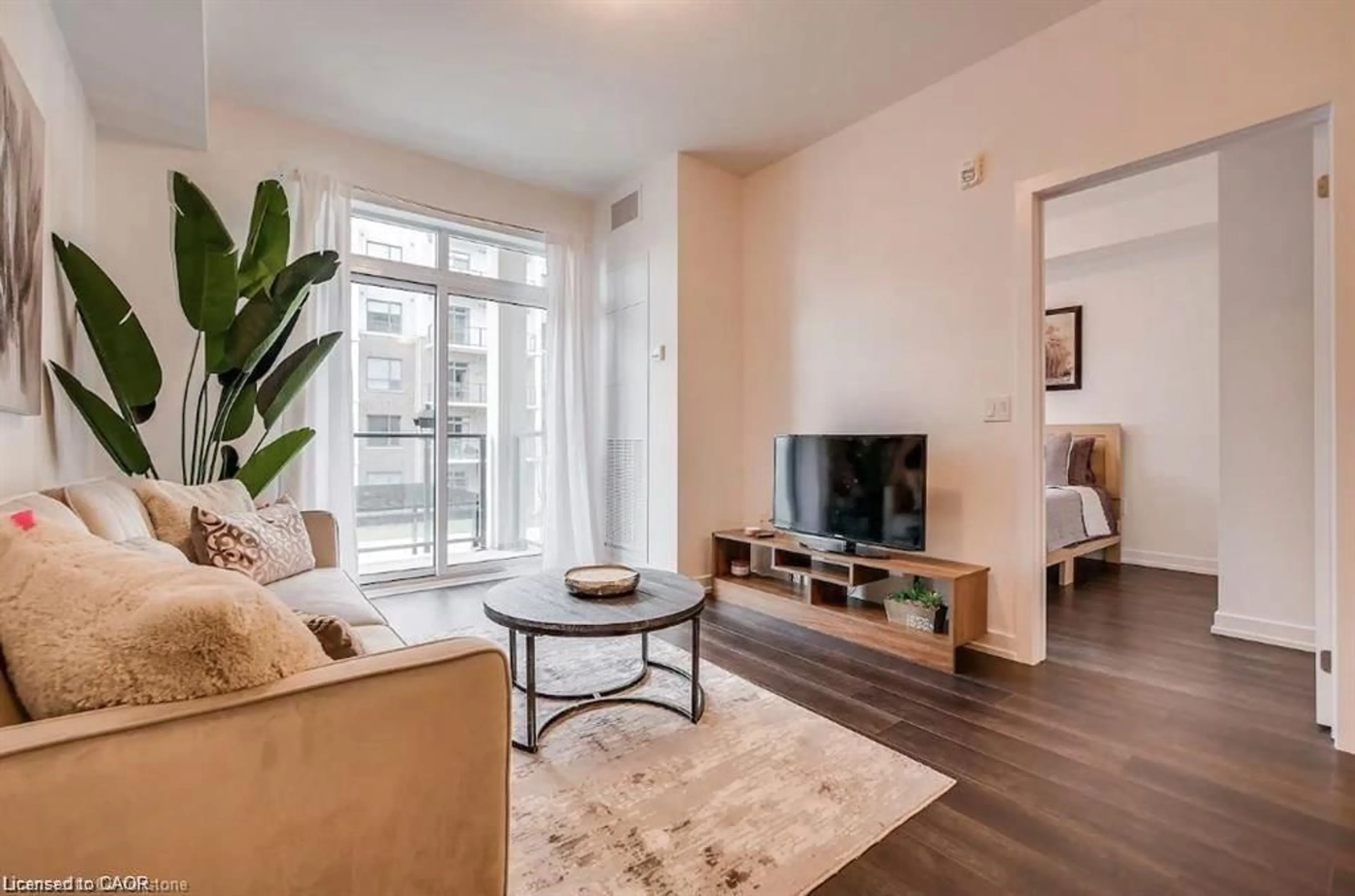 Living room with furniture, unknown for 5055 Greenlane Rd #229, Beamsville Ontario L0R 1B3