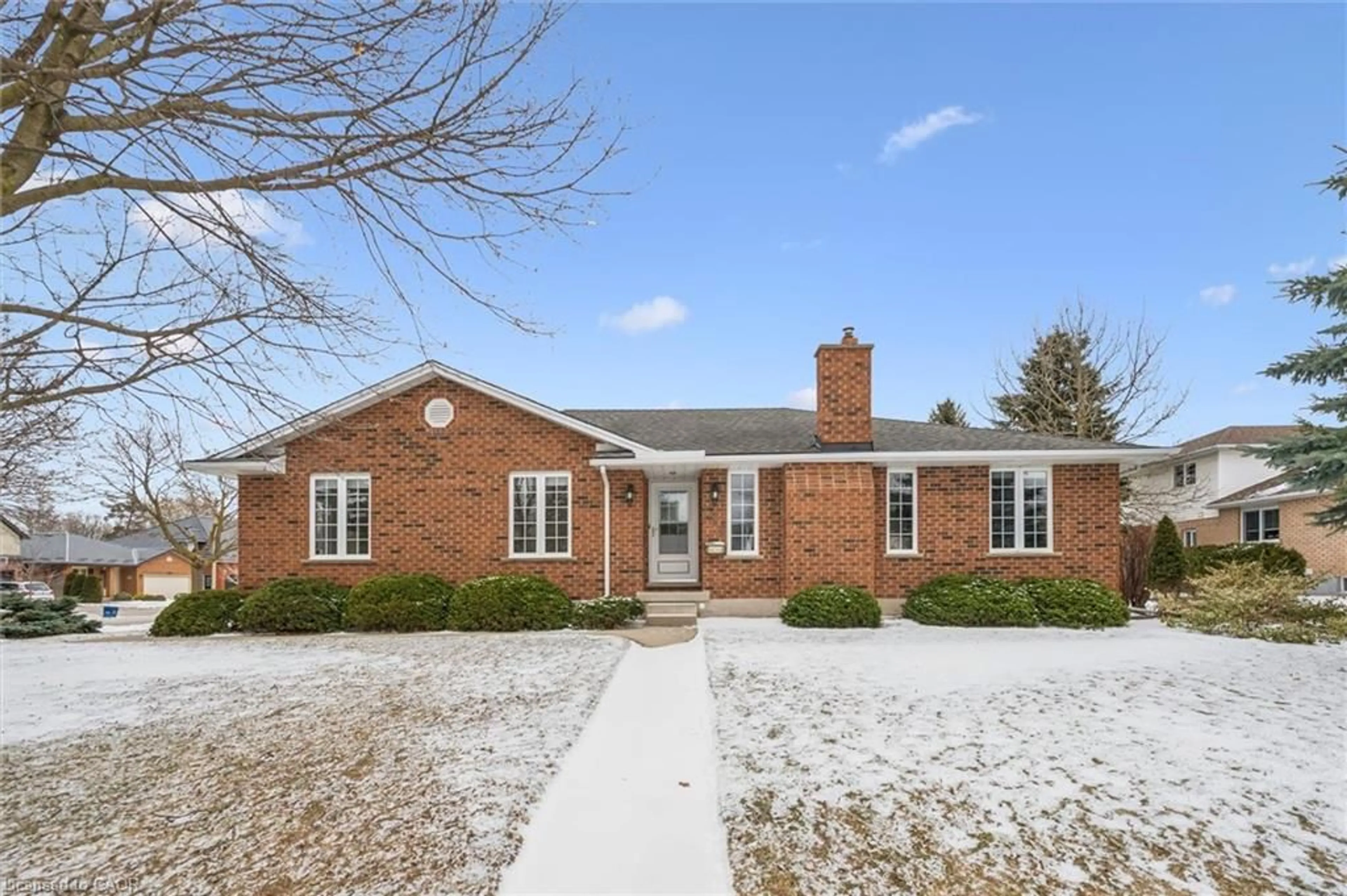 Home with brick exterior material, street for 556 Stanwood Cres, Waterloo Ontario N2K 3P3