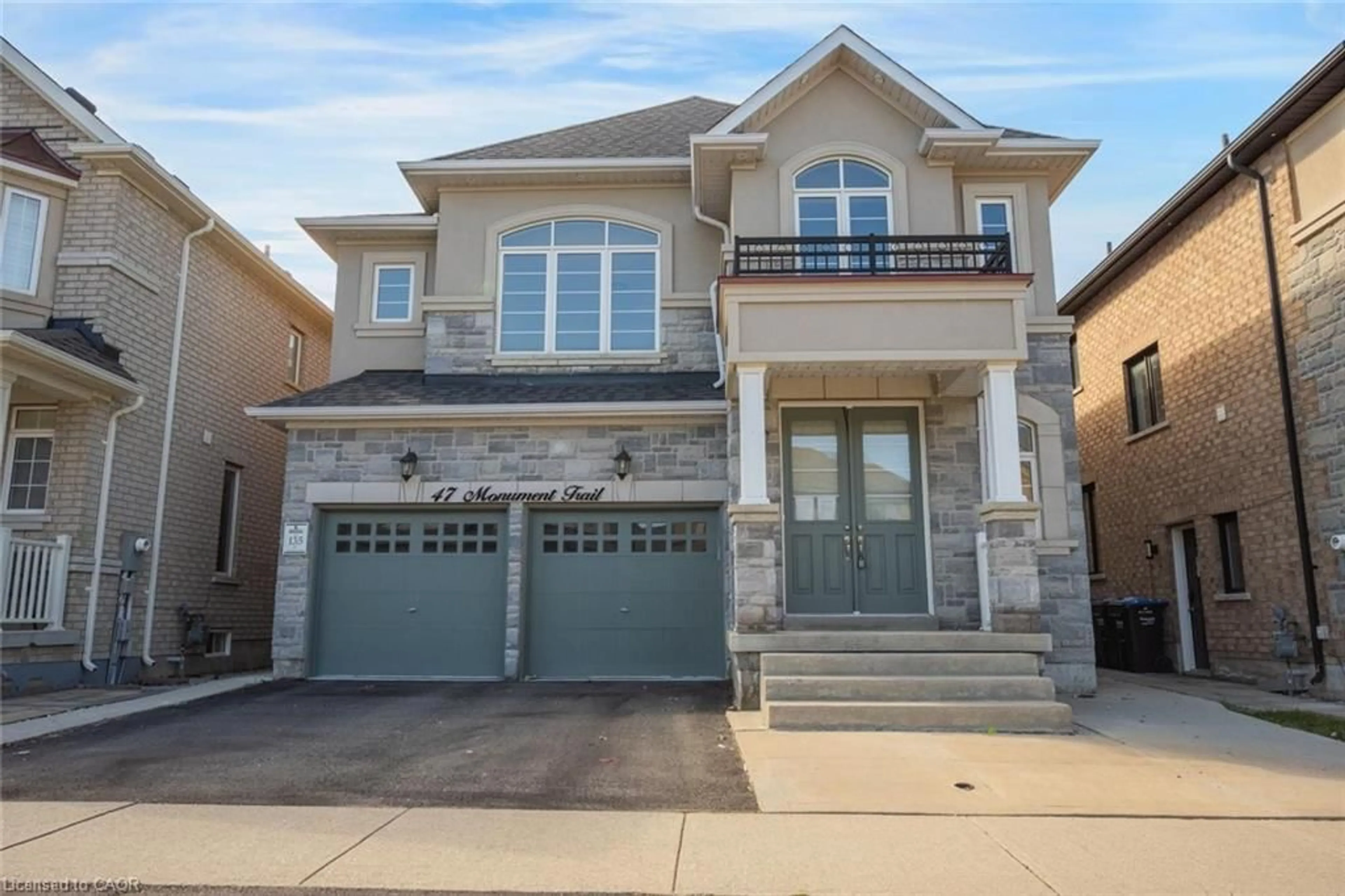 Home with brick exterior material, street for 47 Monument Trail, Brampton Ontario L7A 4M9