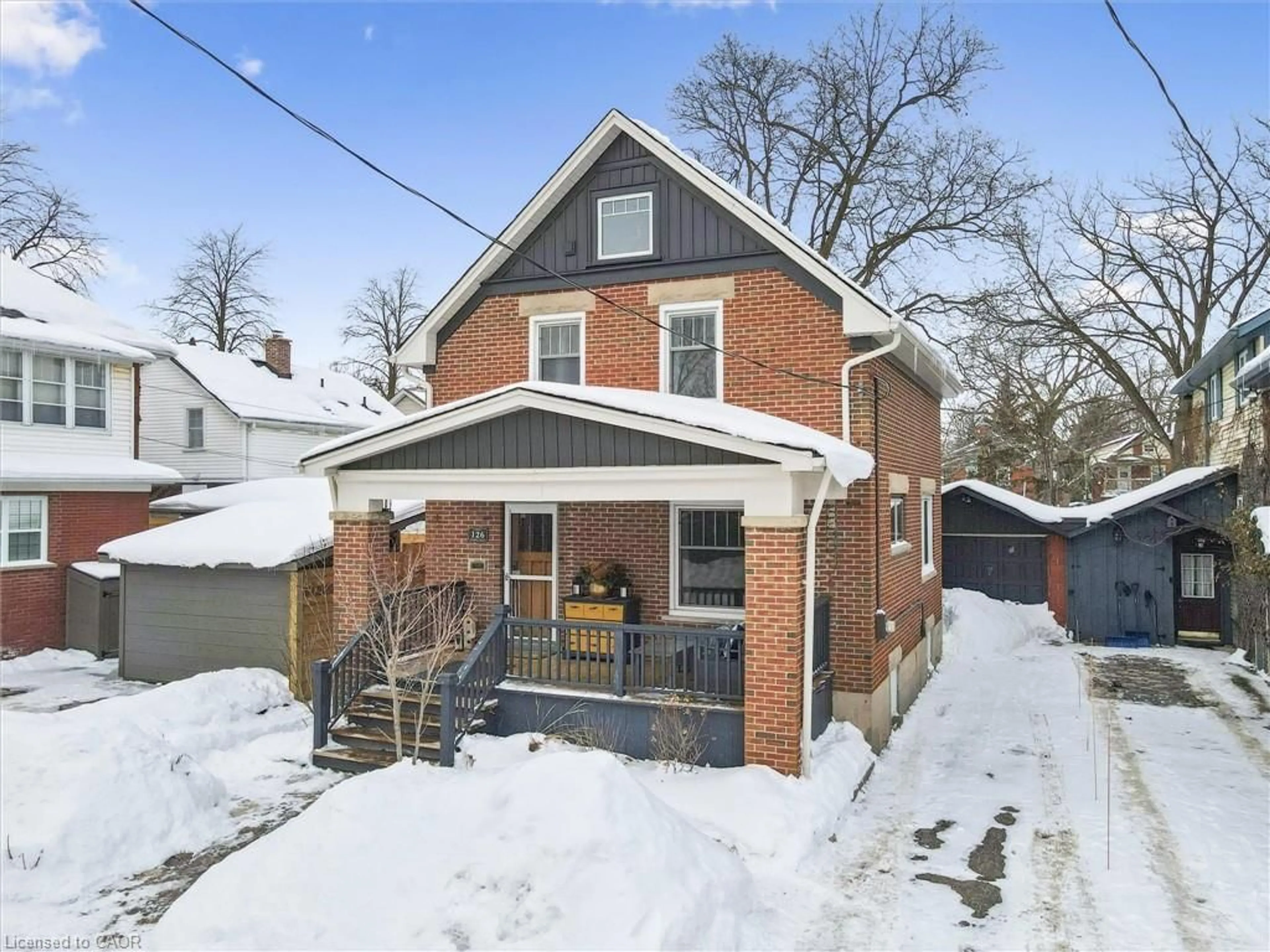 Home with brick exterior material, street for 126 Pandora Ave, Kitchener Ontario N2H 3C8