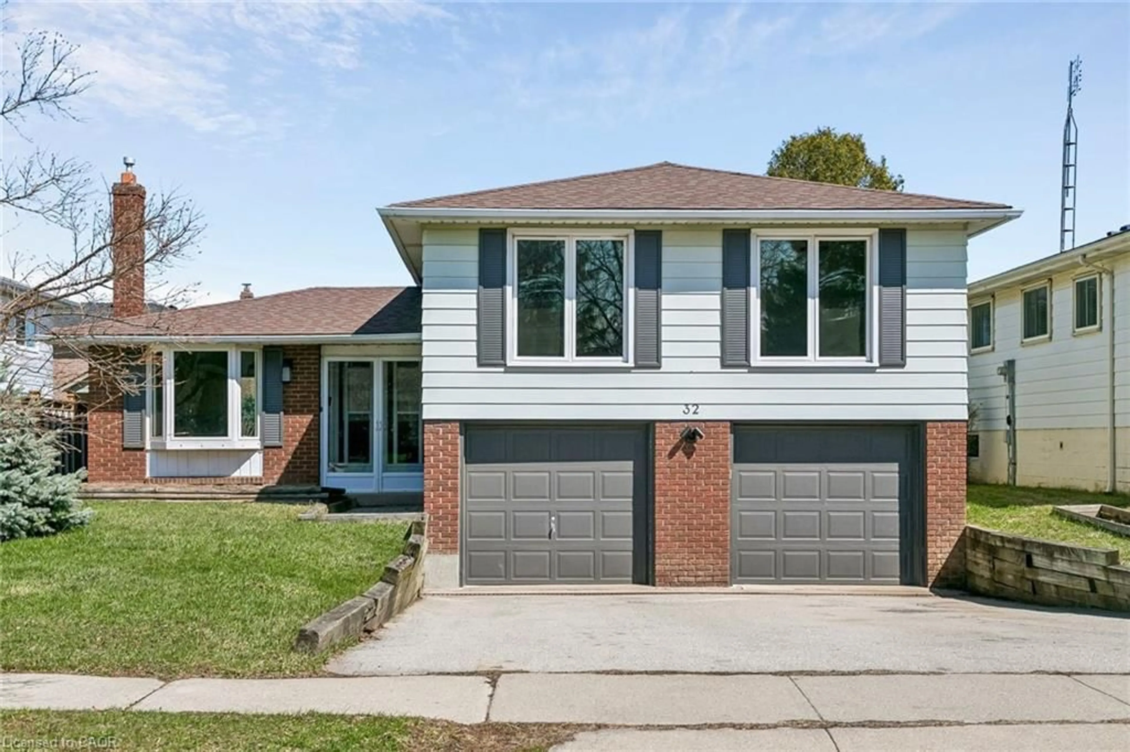 Home with brick exterior material, street for 32 Lynwood Dr, Stoney Creek Ontario L8E 3E9