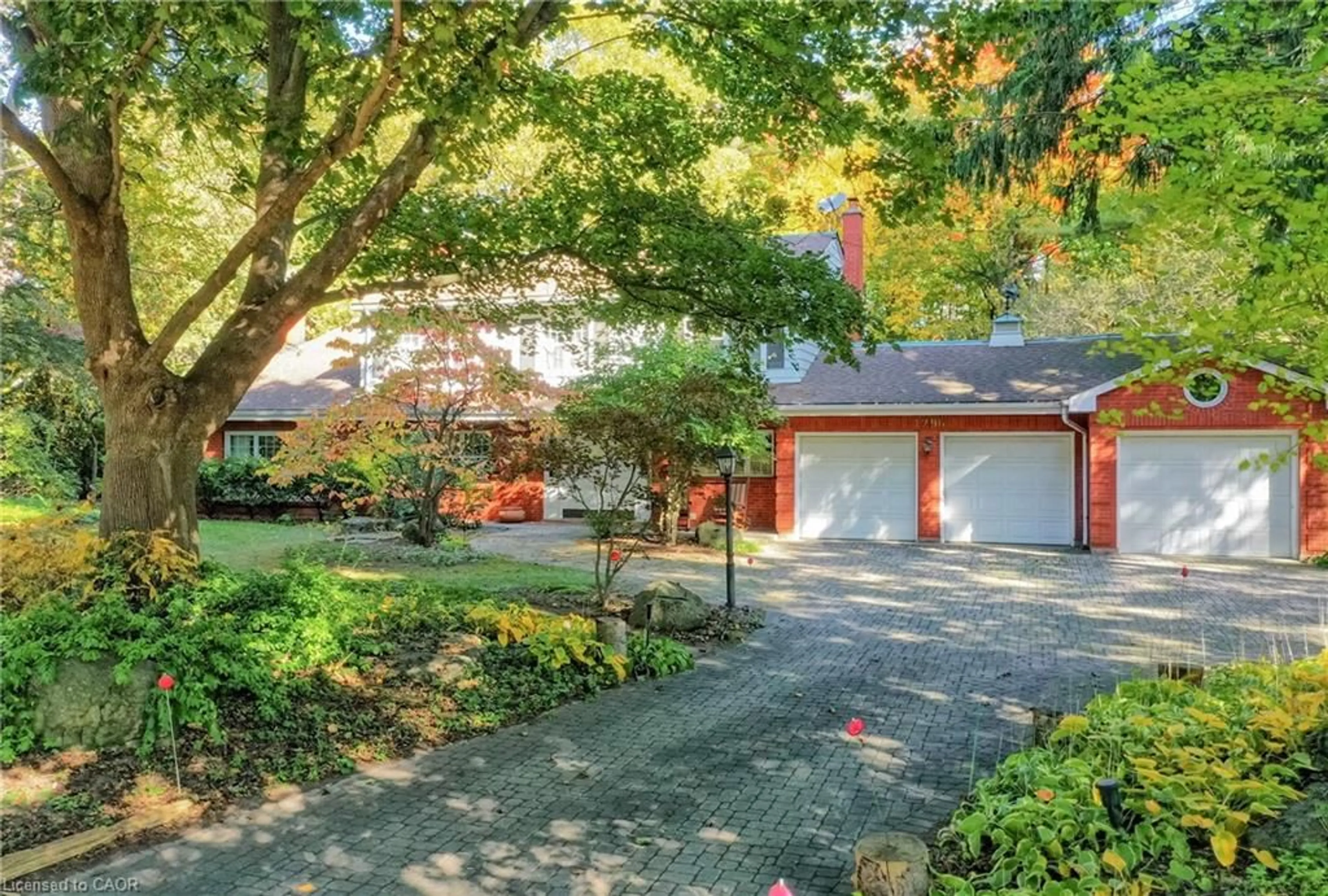 Home with brick exterior material, street for 1296 Cumnock Cres, Oakville Ontario L6J 2N7