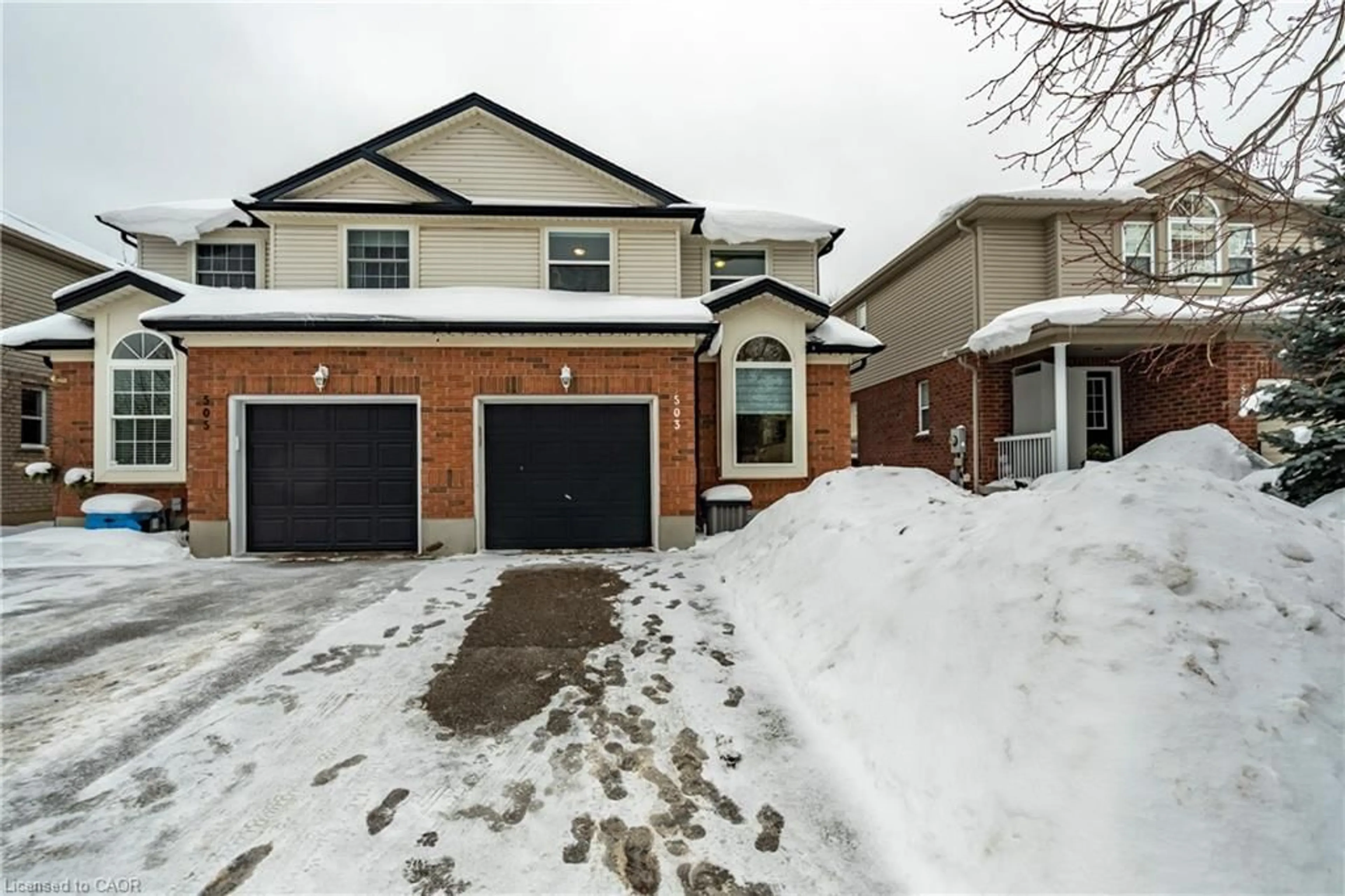 Home with brick exterior material, street for 503 Dansbury Dr, Waterloo Ontario N2K 4K8