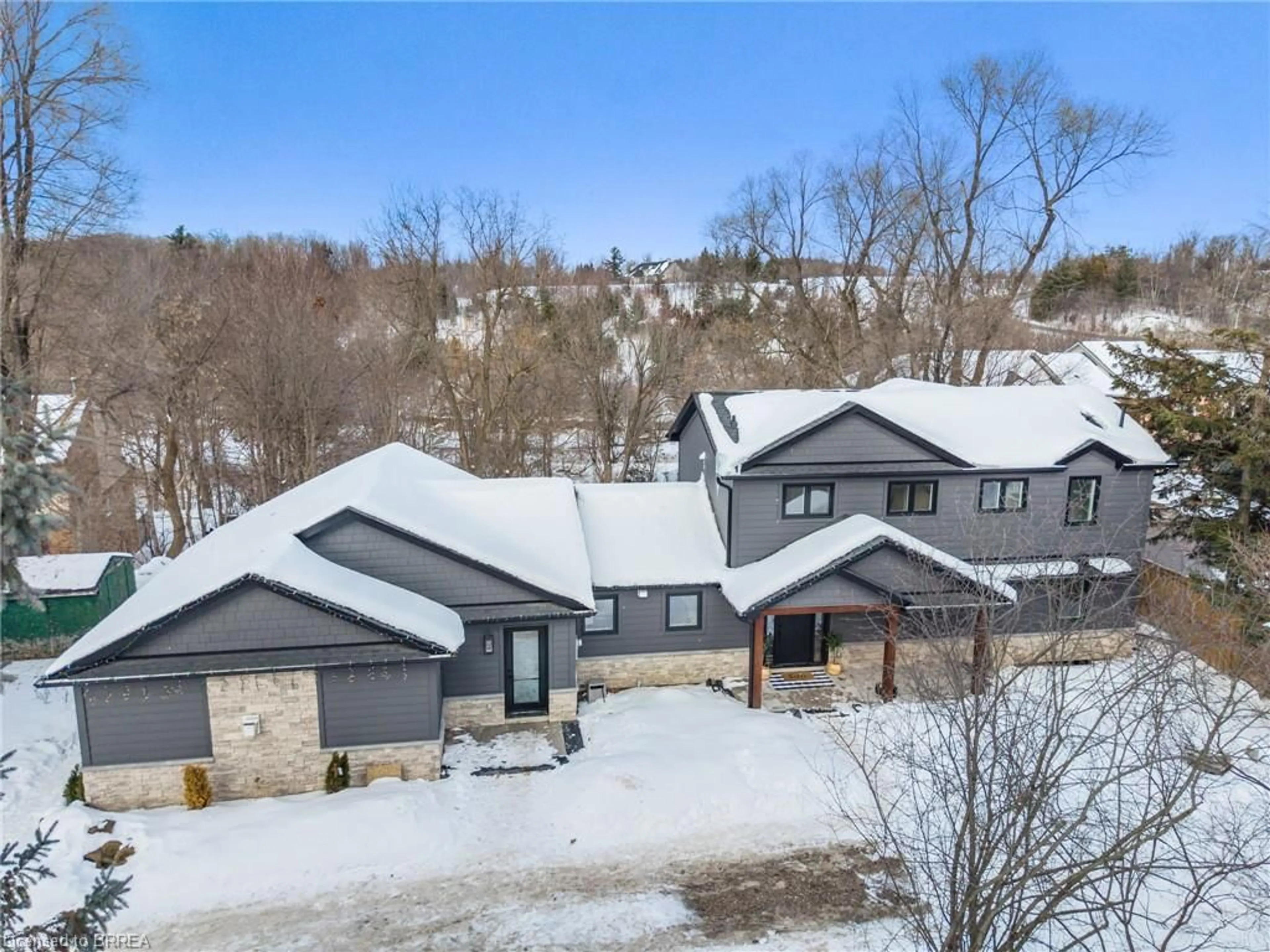 A pic from outside/outdoor area/front of a property/back of a property/a pic from drone, unknown for 70 River Dr, Georgetown Ontario L7G 2J2