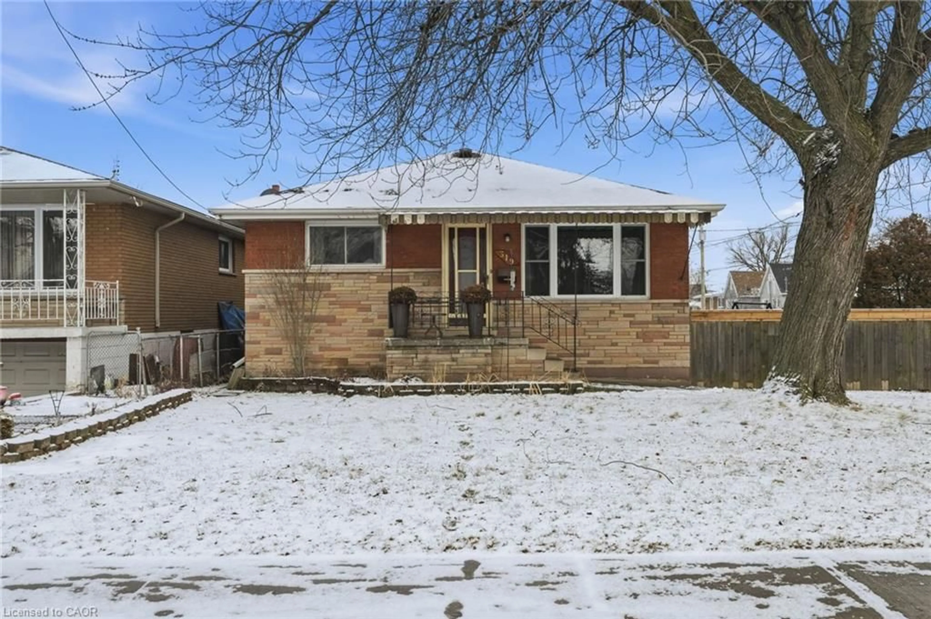 Home with brick exterior material, street for 319 Vansitmart Ave, Hamilton Ontario L8H 3B5