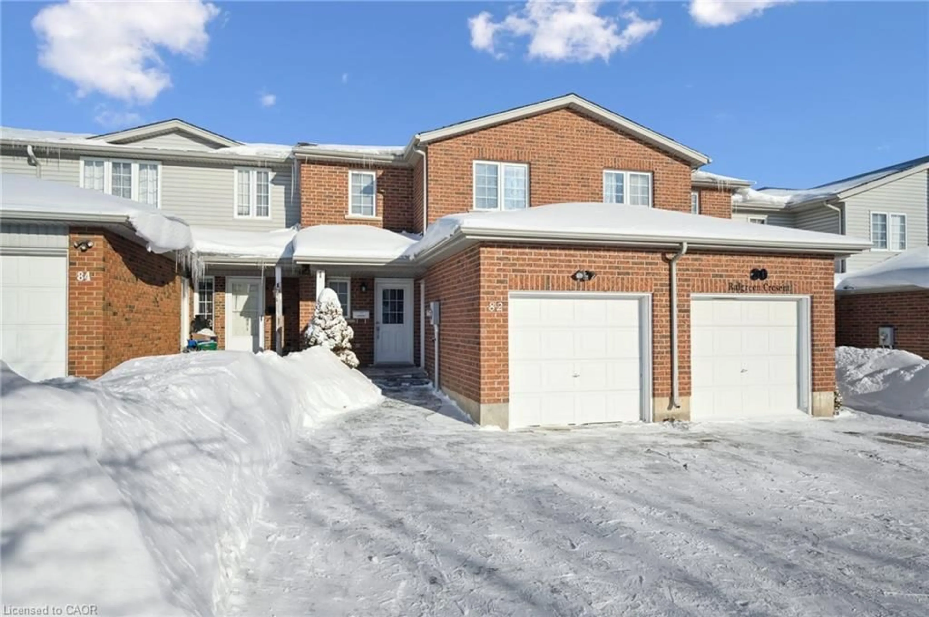 Home with brick exterior material, street for 82 Ralgreen Cres, Kitchener Ontario N2M 1T9