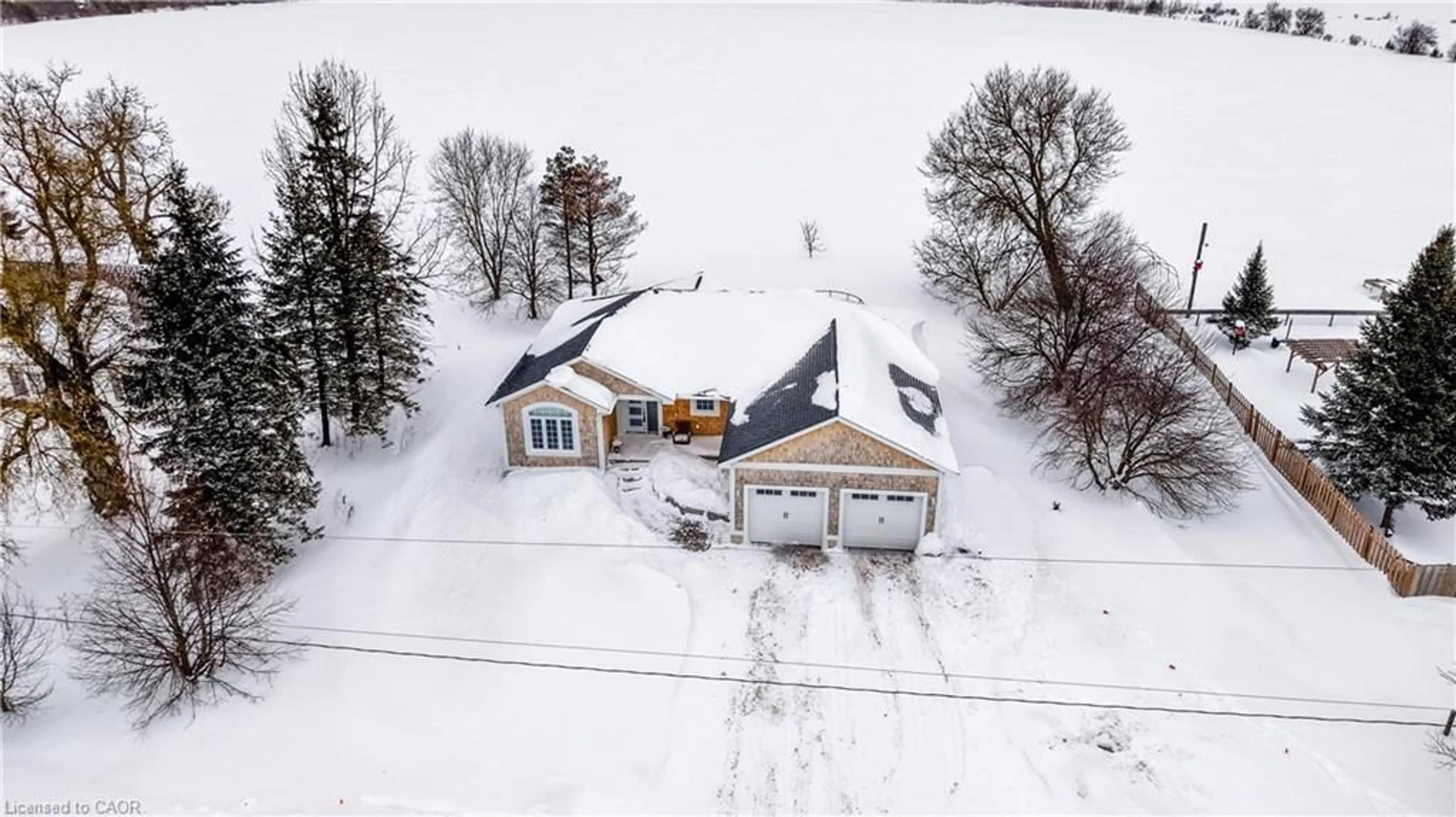 A pic from outside/outdoor area/front of a property/back of a property/a pic from drone, street for 224235 Southgate Road 22, Holstein Ontario N0G 2A0