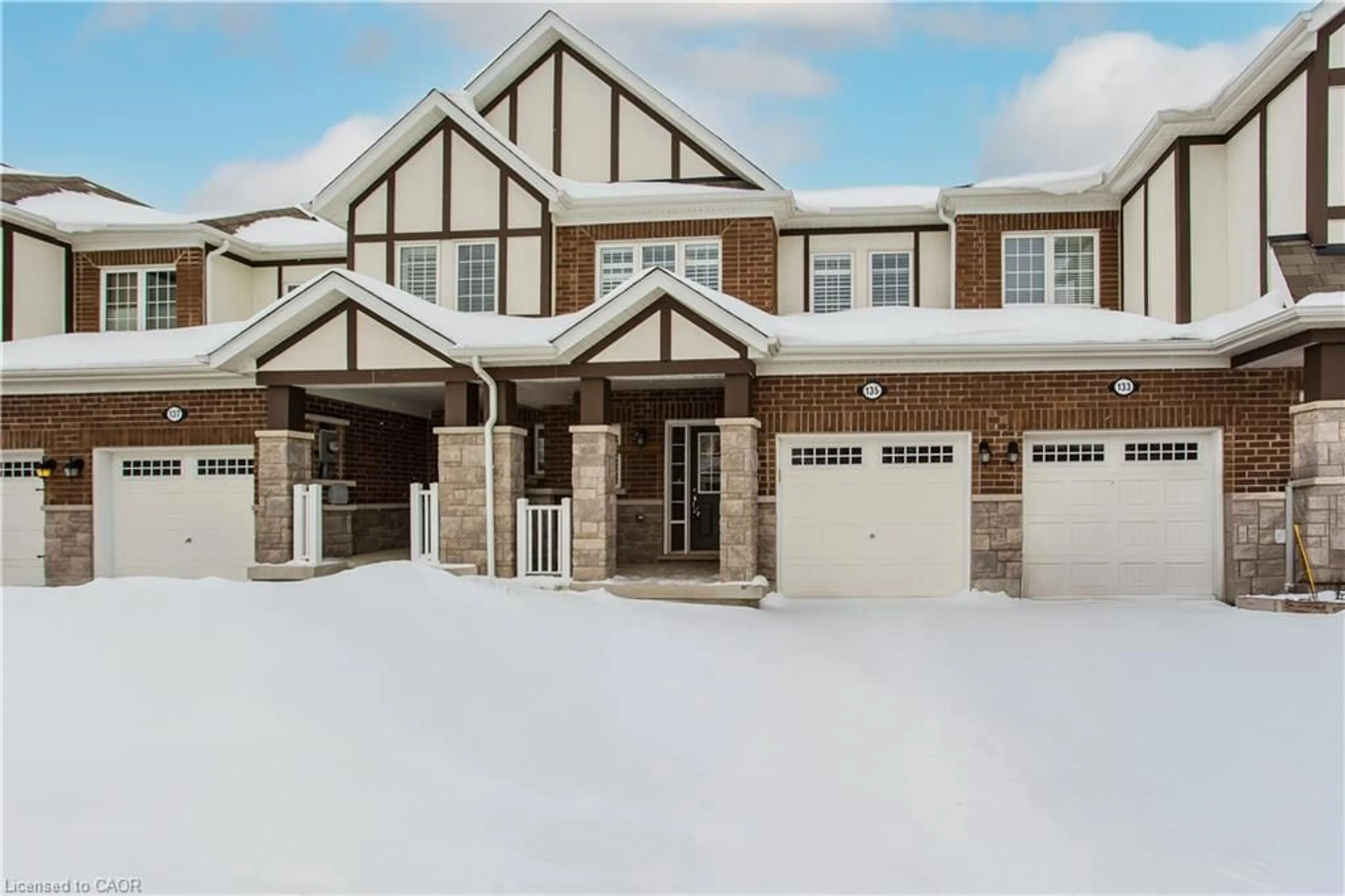 Home with brick exterior material, street for 135 Mcmonies Dr, Waterdown Ontario L8B 0A6