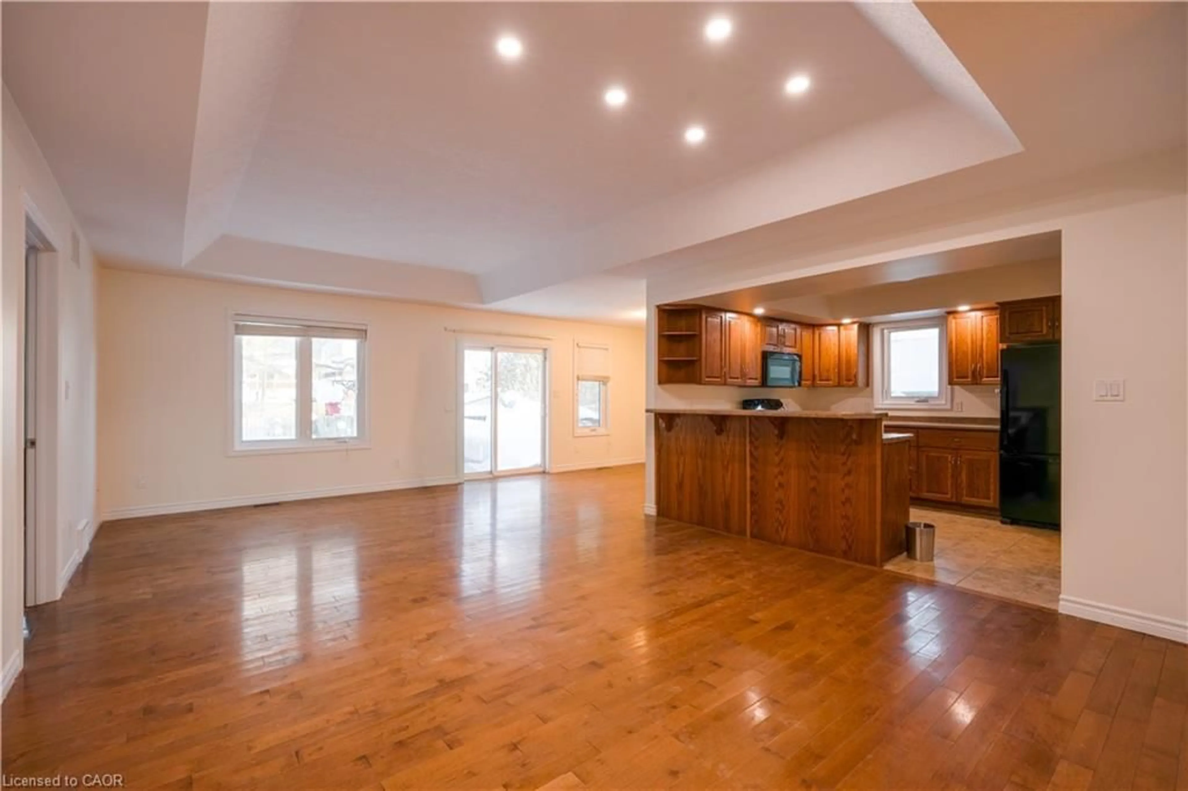 Open concept kitchen, wood/laminate floor for 401 Carling Terr, Wingham Ontario N0G 2W0