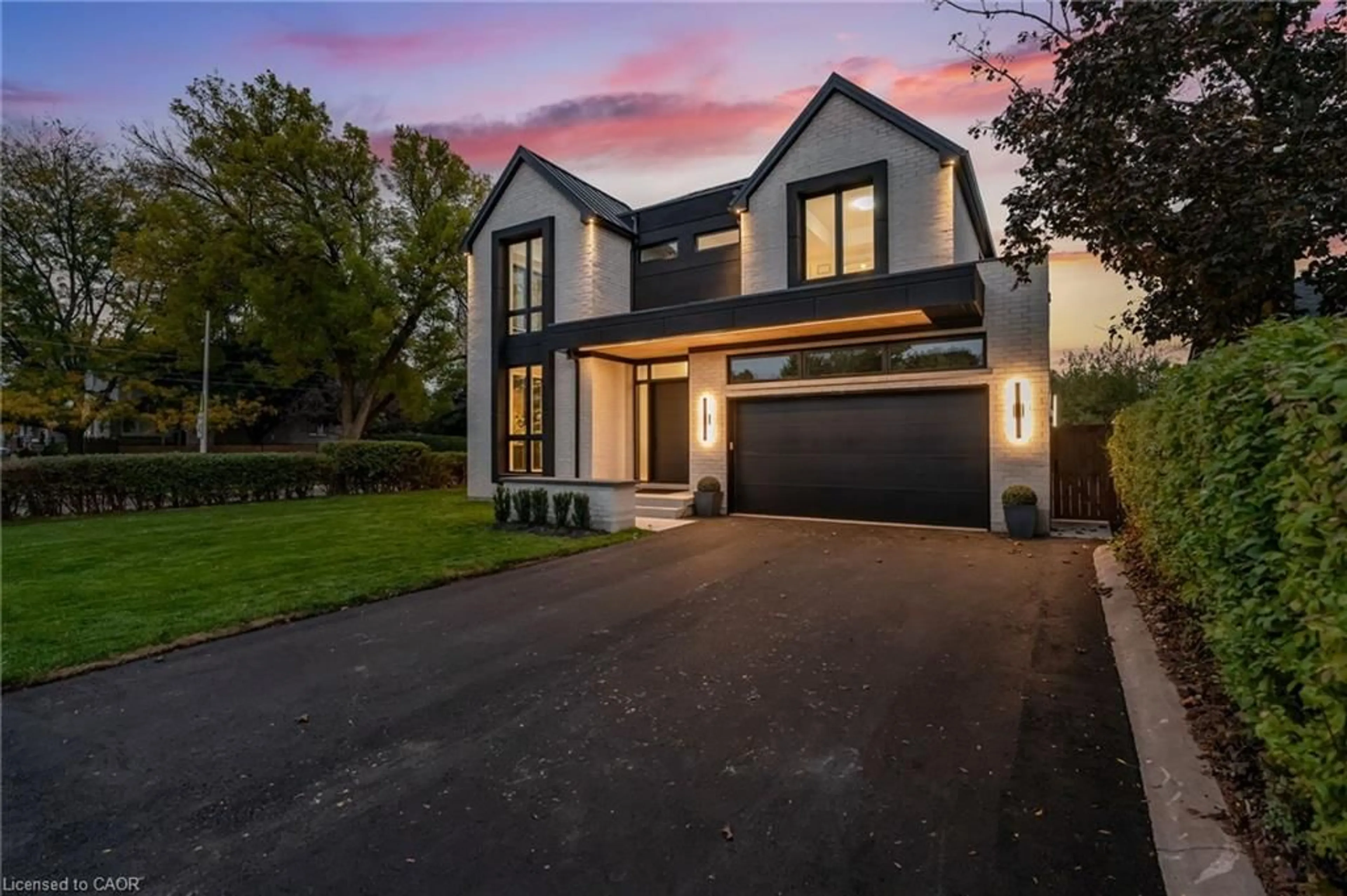 Home with brick exterior material, street for 144 Mansfield Dr, Oakville Ontario L6H 1K4