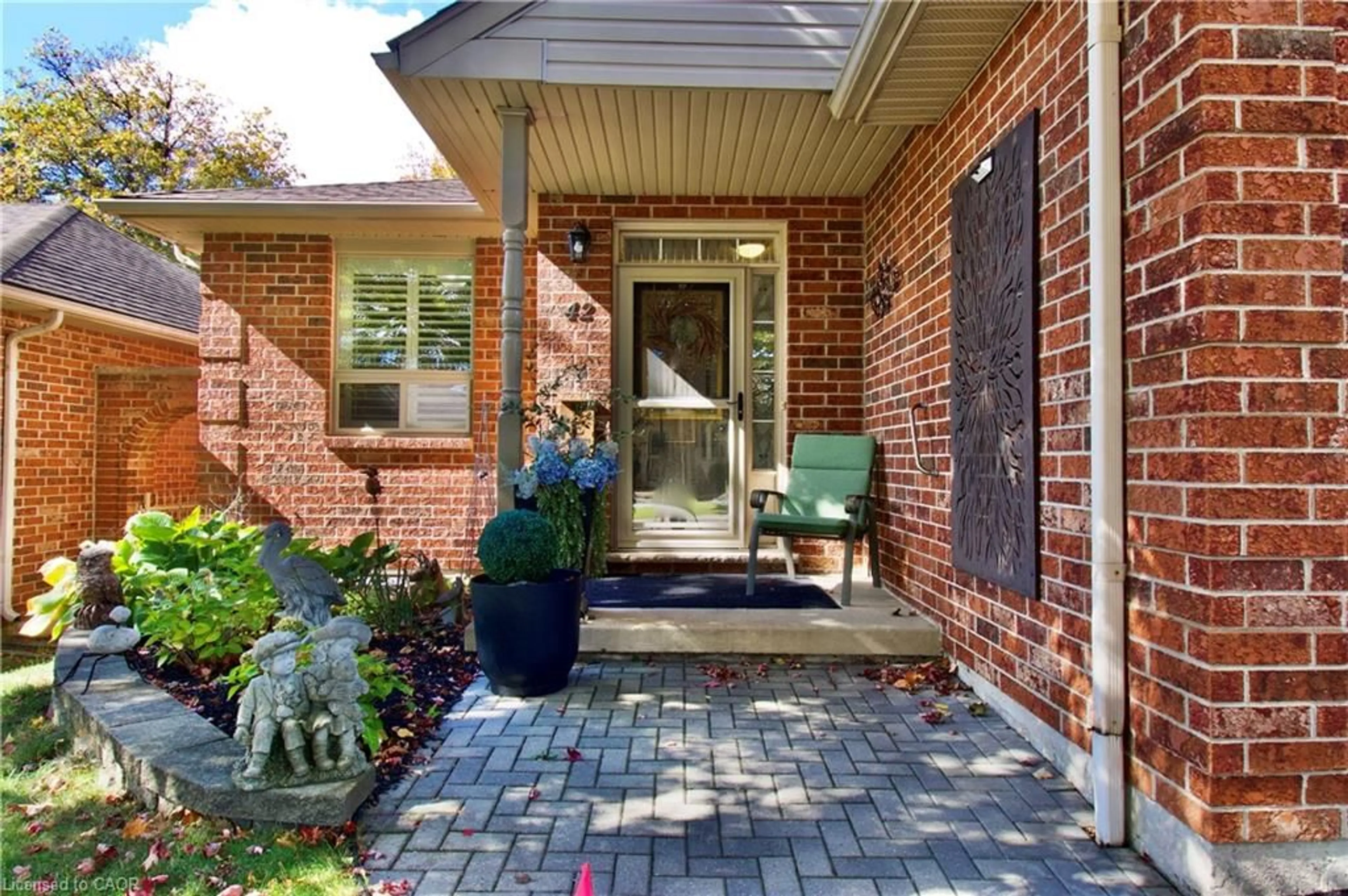 Home with brick exterior material, street for 42 Greentrail Dr, Hamilton Ontario L0R 1W0