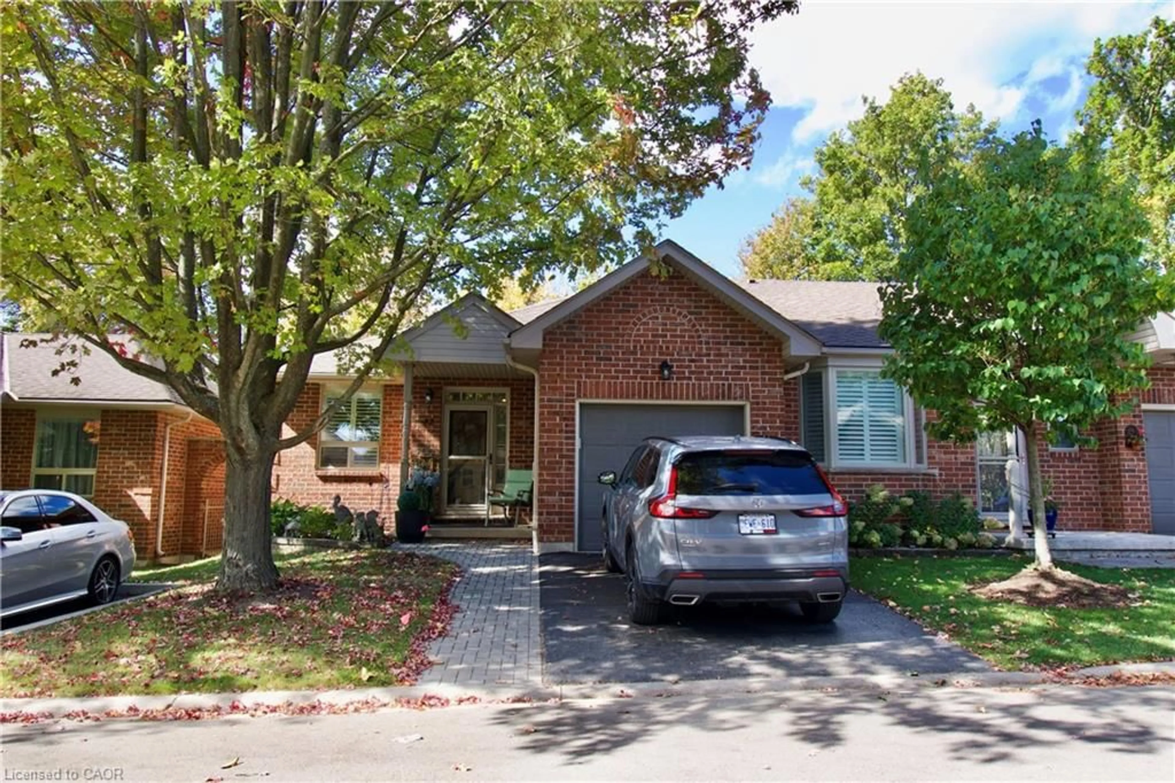 Home with brick exterior material, street for 42 Greentrail Dr, Hamilton Ontario L0R 1W0