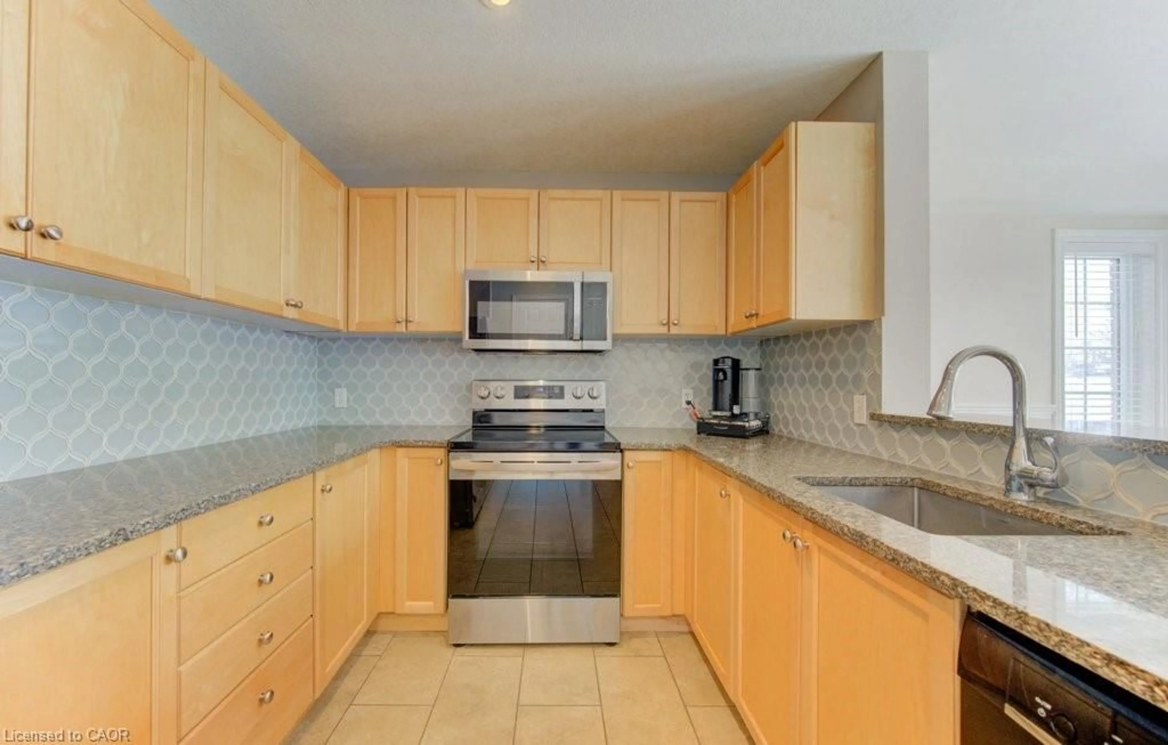 Standard kitchen, ceramic/tile floor for 404 Wake Robin Cres, Kitchener Ontario N2E 3L6