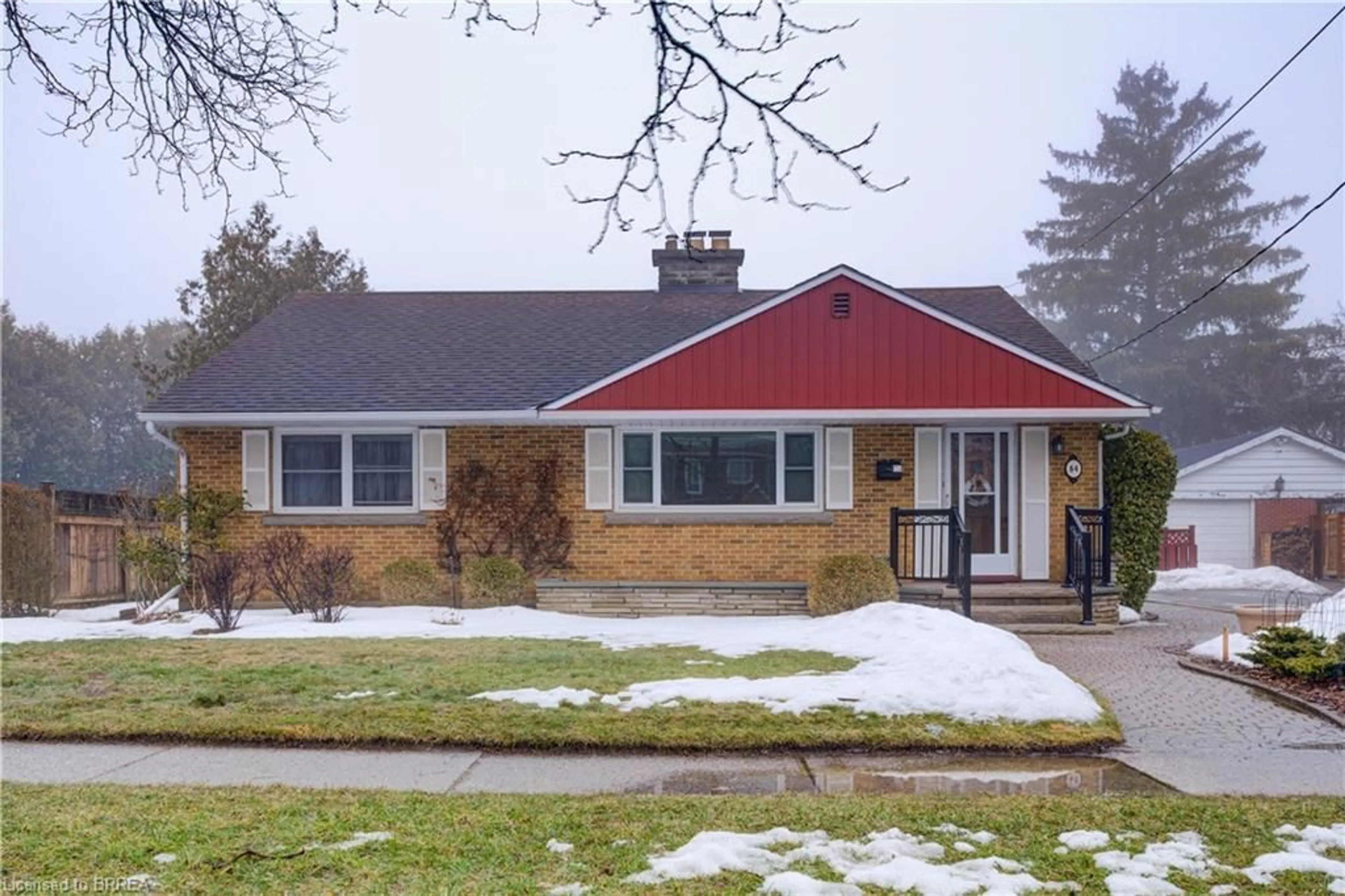 Home with brick exterior material, street for 64 The Strand Ave, Brantford Ontario N3R 1Z4