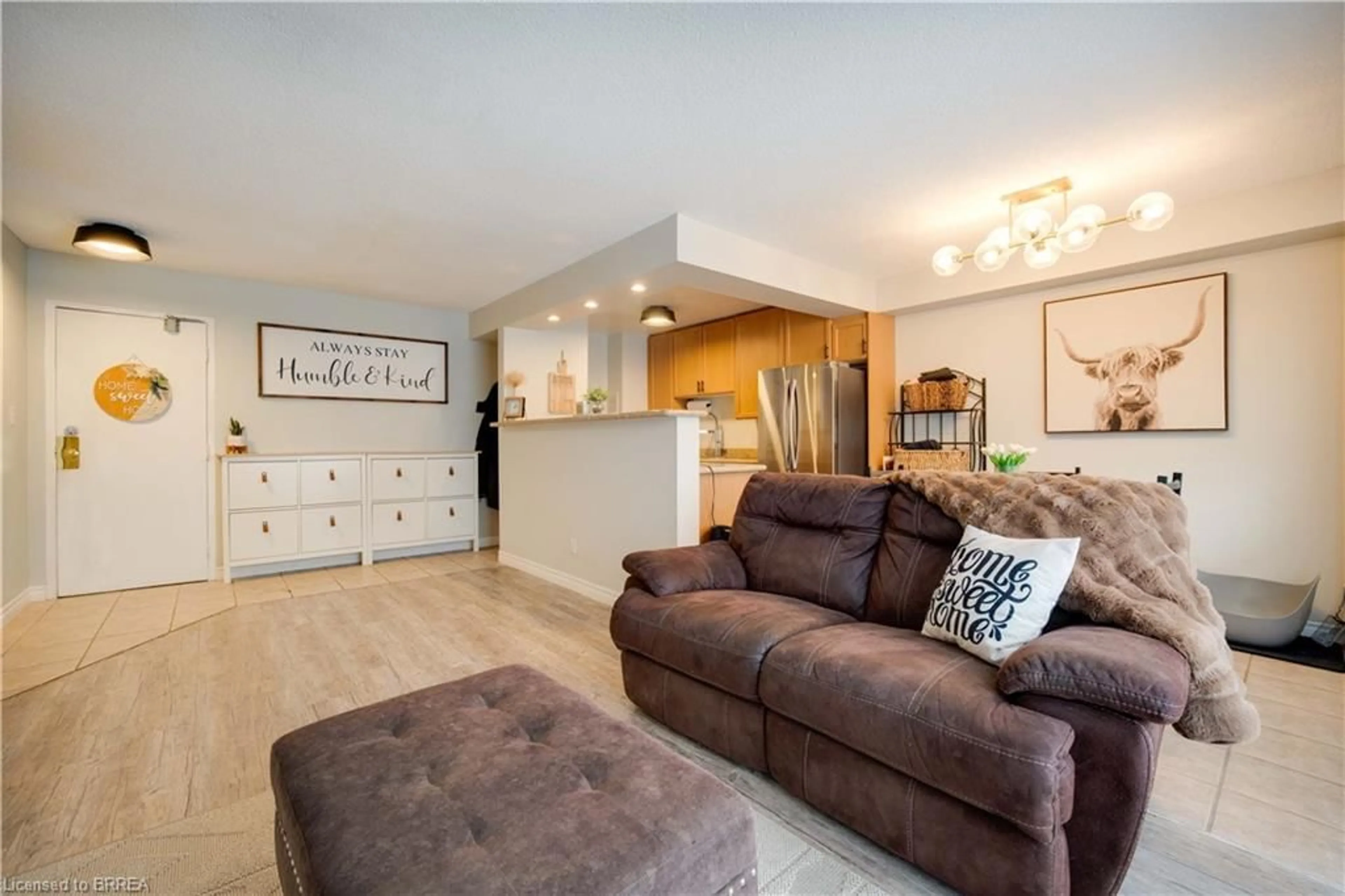 Living room with furniture, unknown for 793 Colborne St #304, Brantford Ontario N3S 7J3