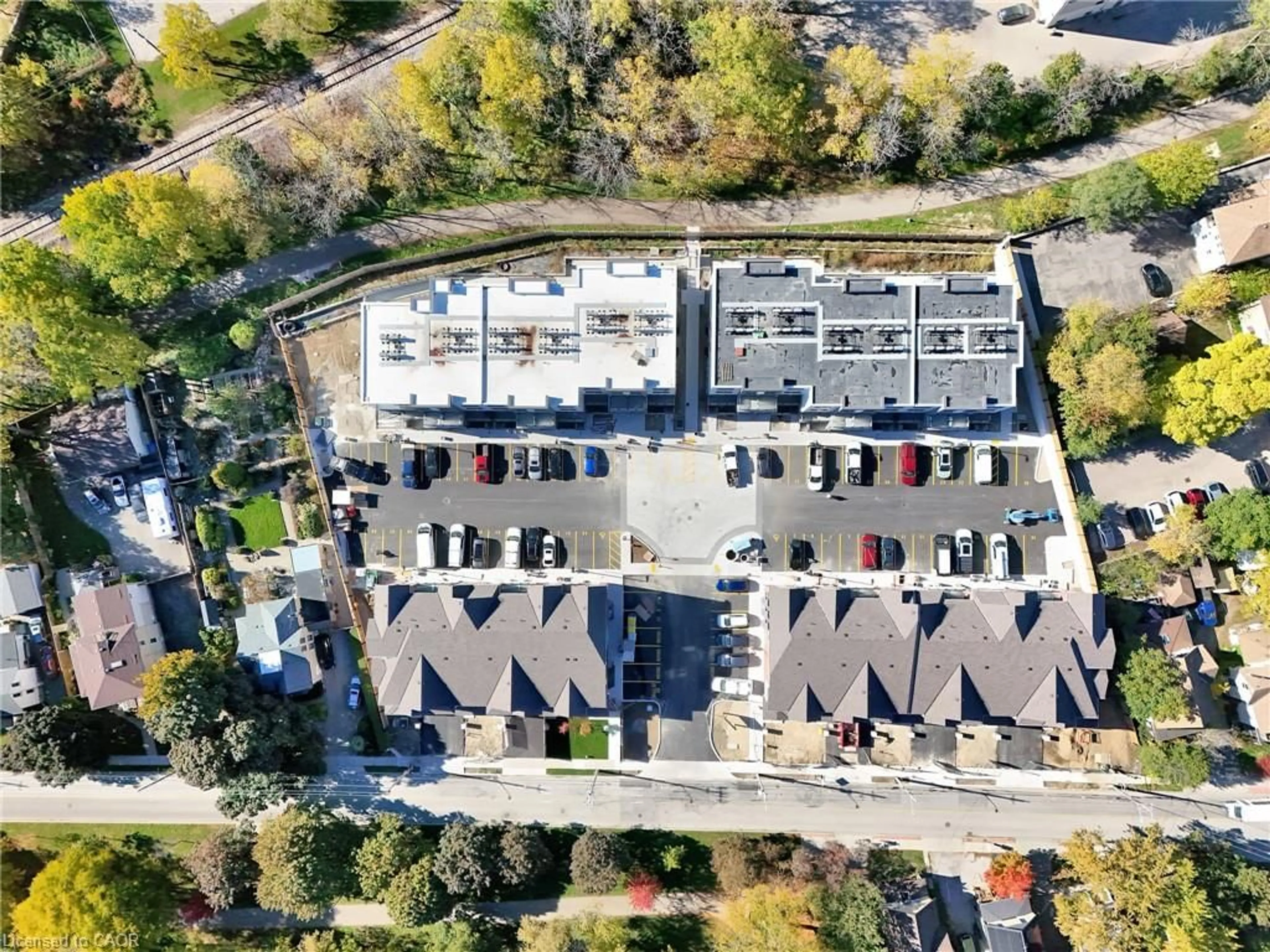 A pic from outside/outdoor area/front of a property/back of a property/a pic from drone, city buildings view from balcony for 31 Mill St #59, Kitchener Ontario N2G 0G6