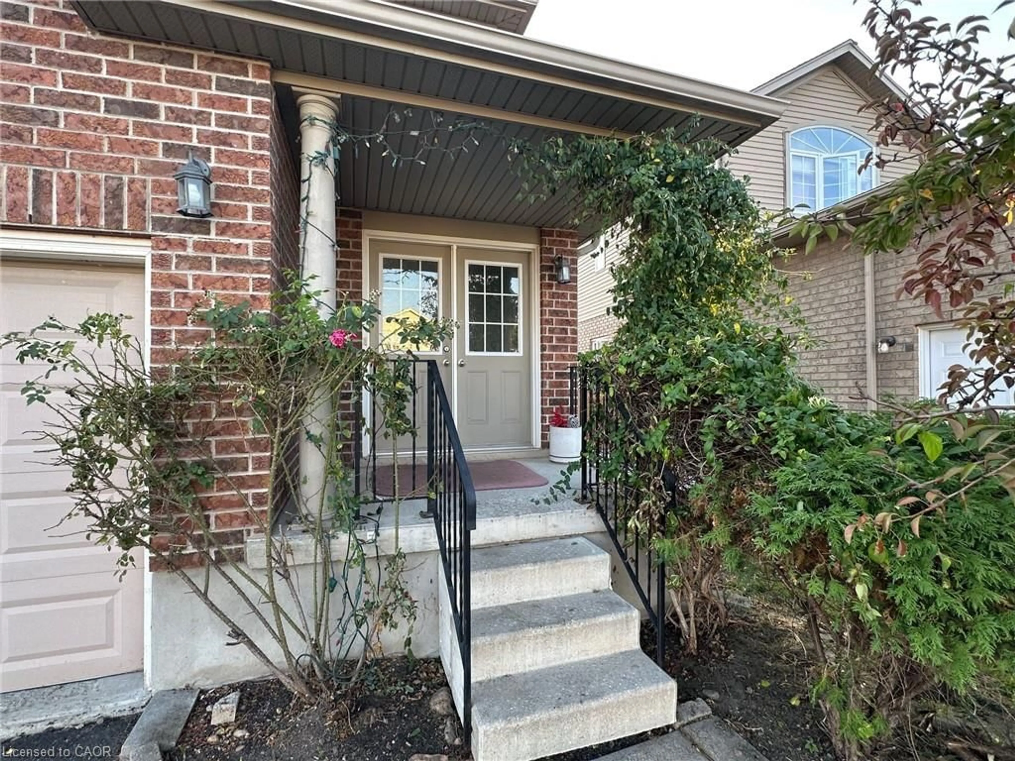 Home with brick exterior material, street for 1353 Old Zeller Dr, Kitchener Ontario N2A 0C6
