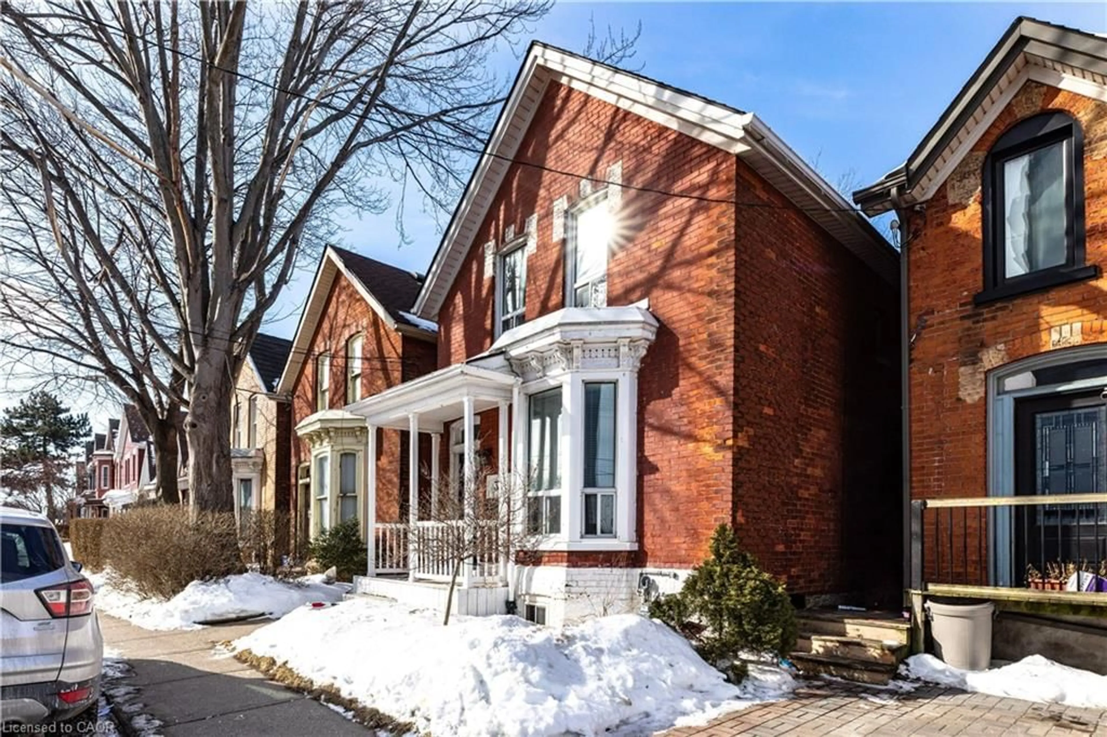 Home with brick exterior material, street for 33 Oxford St, Hamilton Ontario L8R 2W9