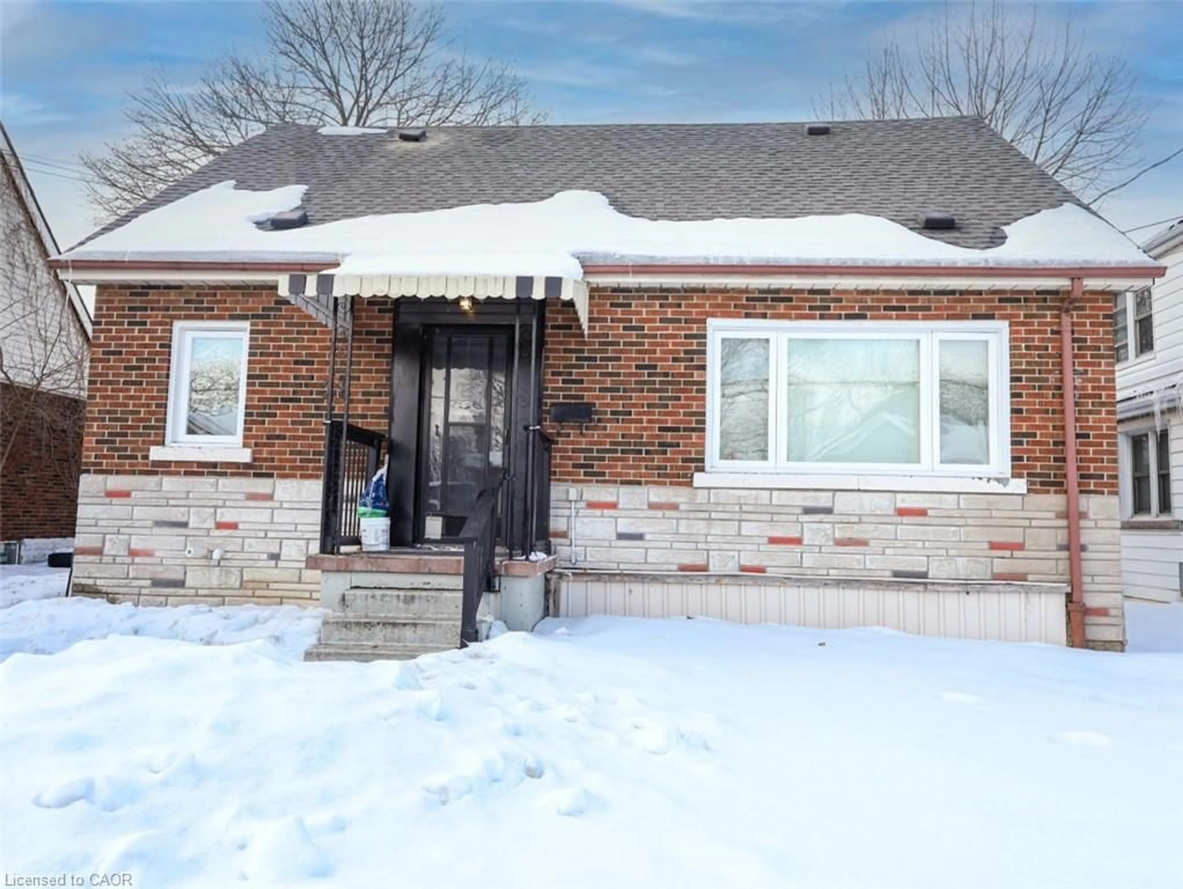 Home with brick exterior material, street for 28 West 3rd St, Hamilton Ontario L9C 3L7