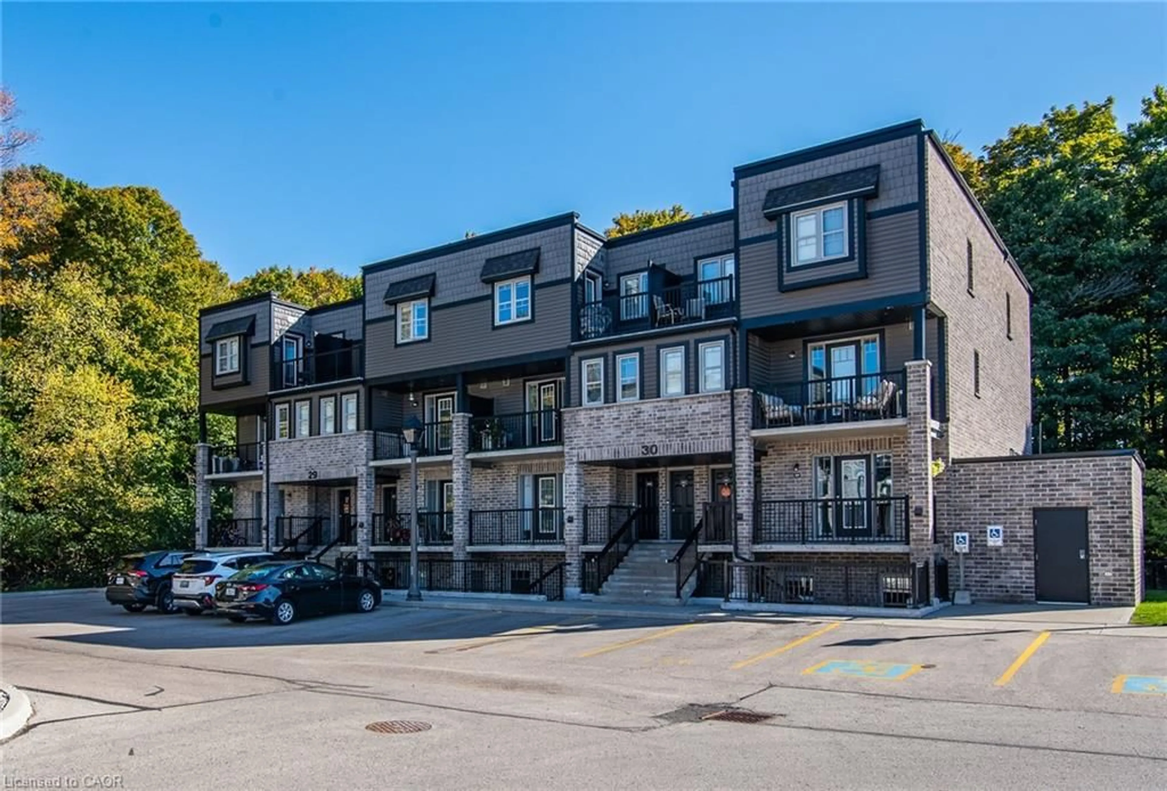 A pic from outside/outdoor area/front of a property/back of a property/a pic from drone, street for 1989 Ottawa St #29c, Kitchener Ontario N2E 0G7