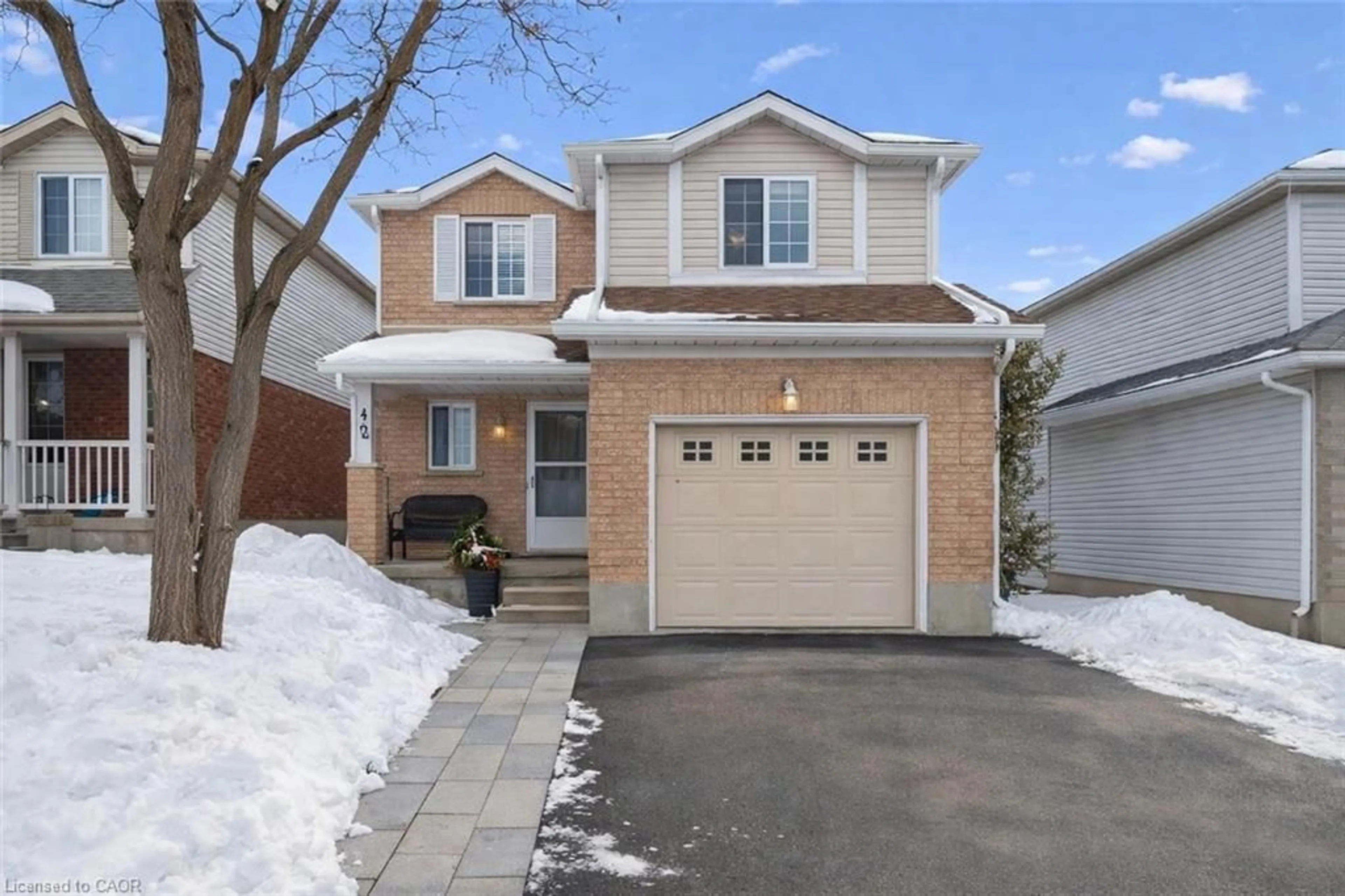 Home with brick exterior material, street for 42 Tara Cres, Kitchener Ontario N2E 3K9