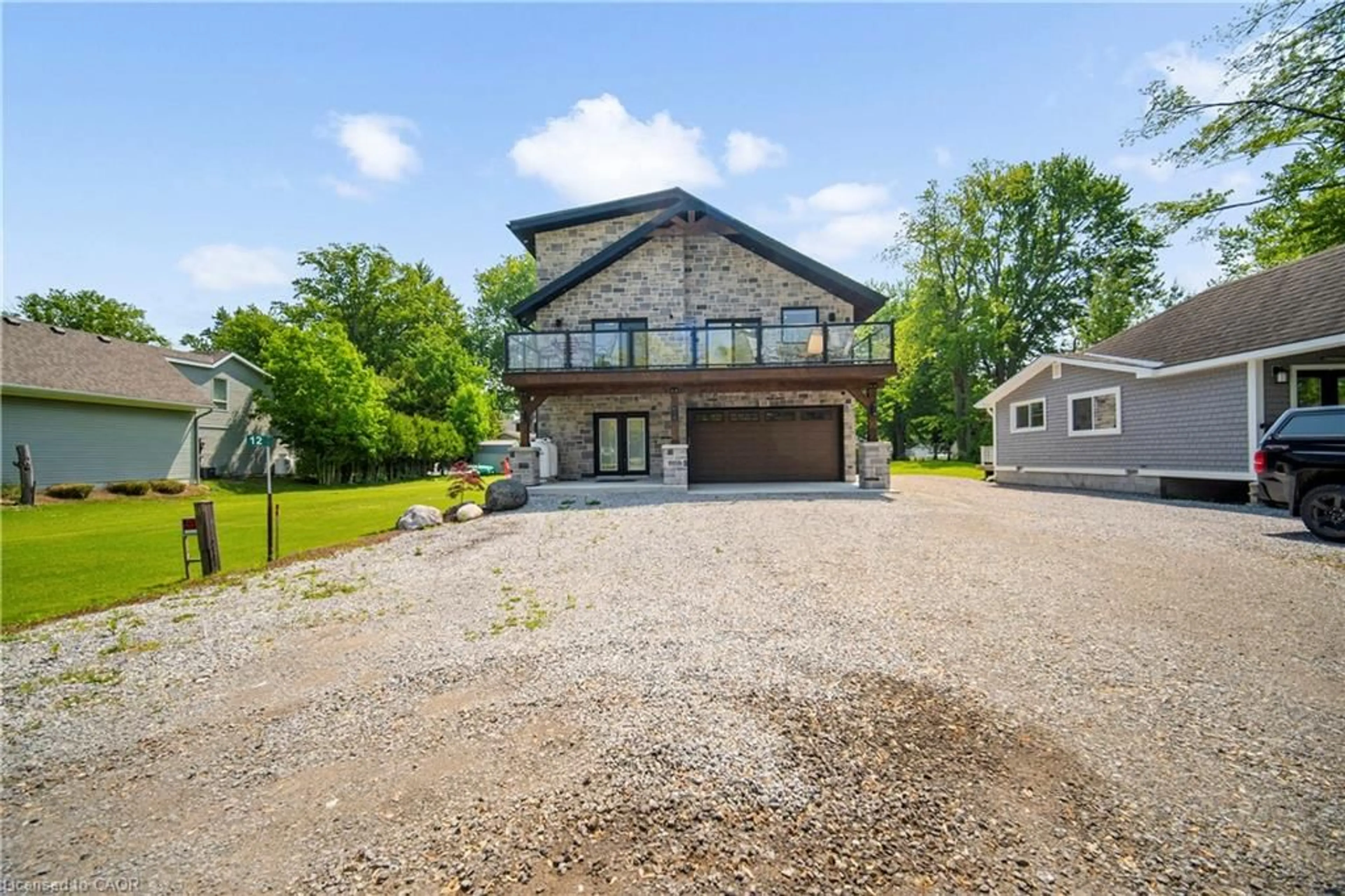 A pic from outside/outdoor area/front of a property/back of a property/a pic from drone, water/lake/river/ocean view for 12 Park Lane Cres, Turkey Point Ontario N0E 1T0