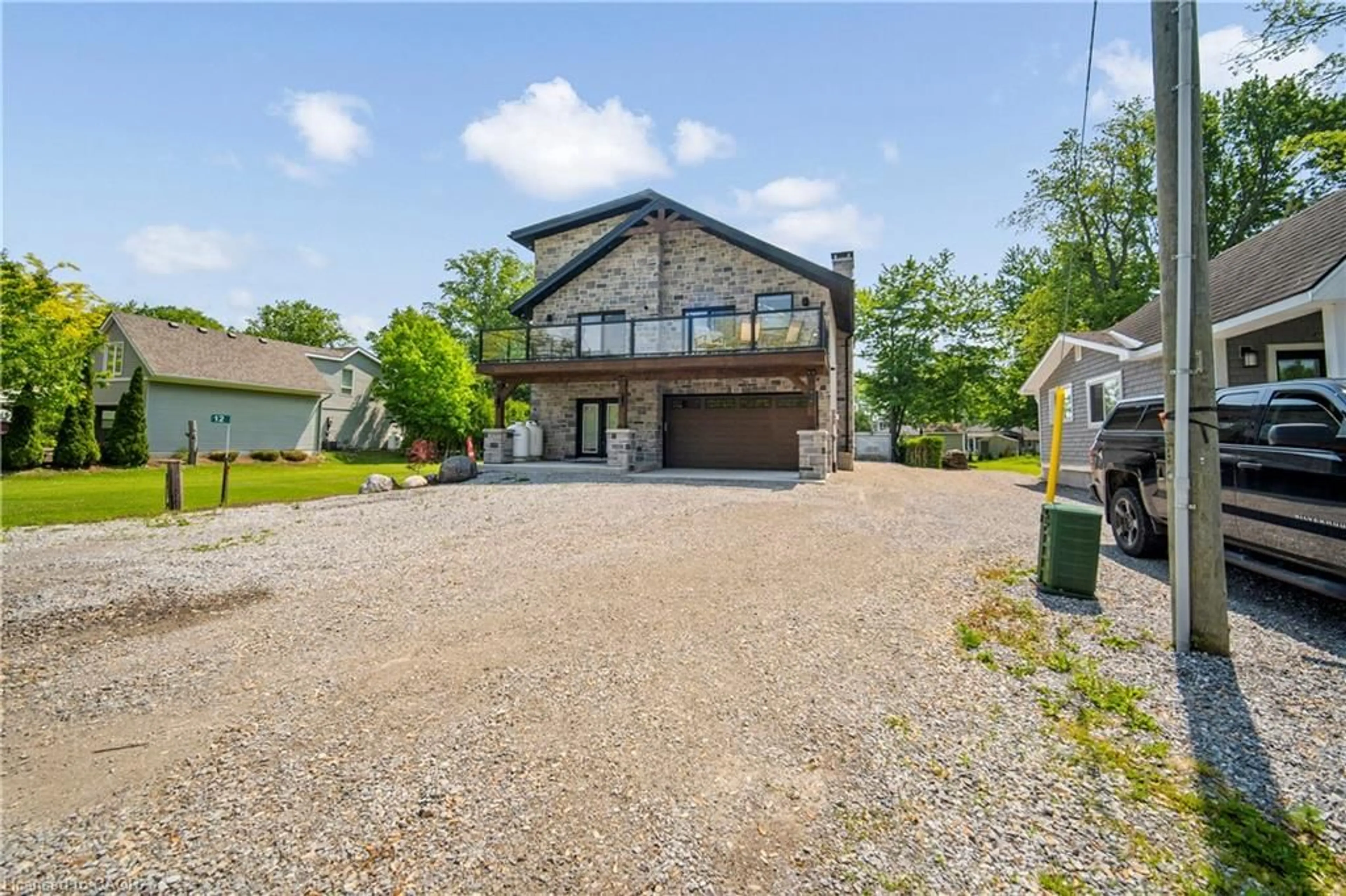 A pic from outside/outdoor area/front of a property/back of a property/a pic from drone, unknown for 12 Park Lane Cres, Turkey Point Ontario N0E 1T0