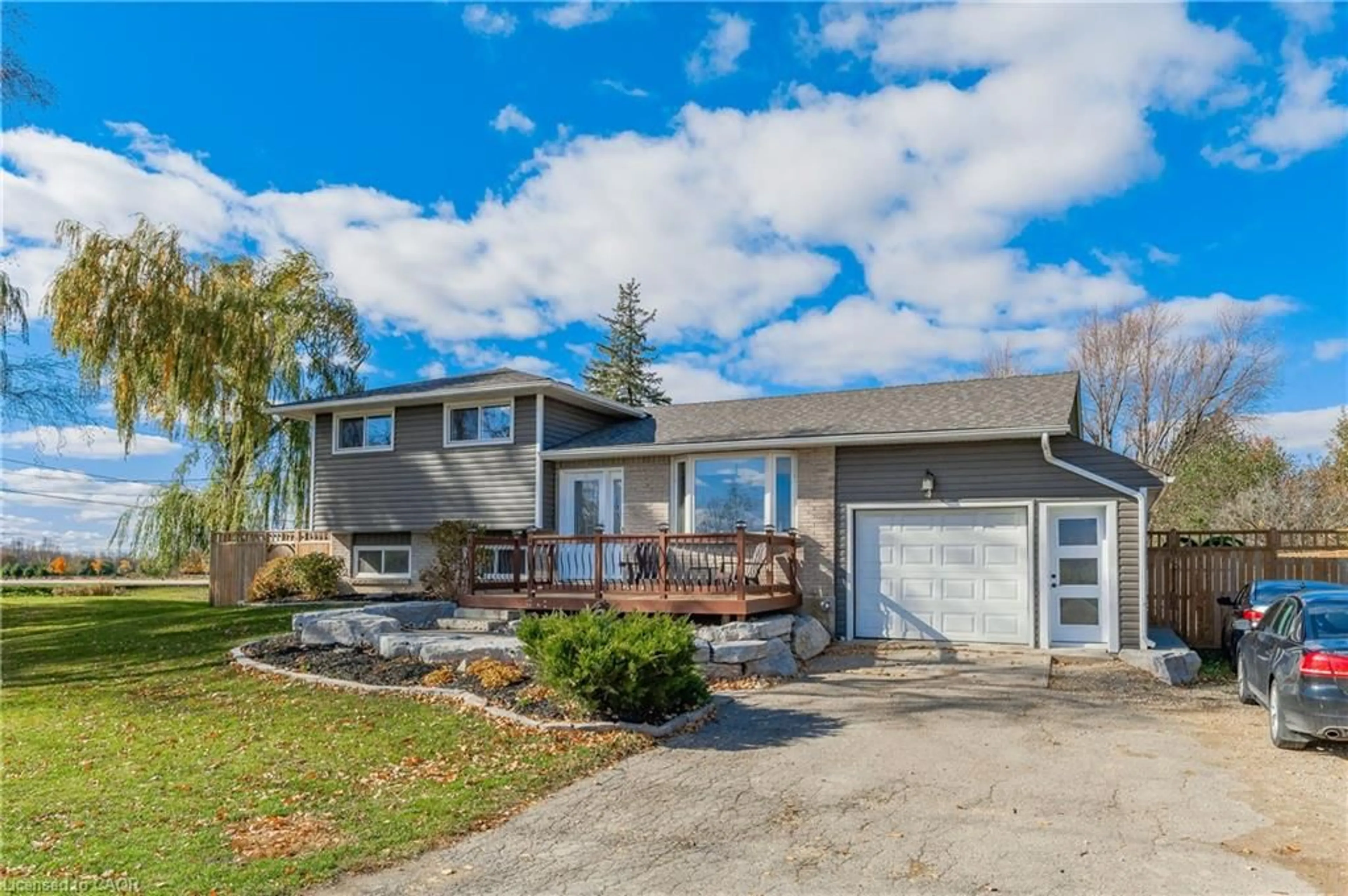 Home with vinyl exterior material, street for 4 First Line, Elora Ontario N0B 1S0