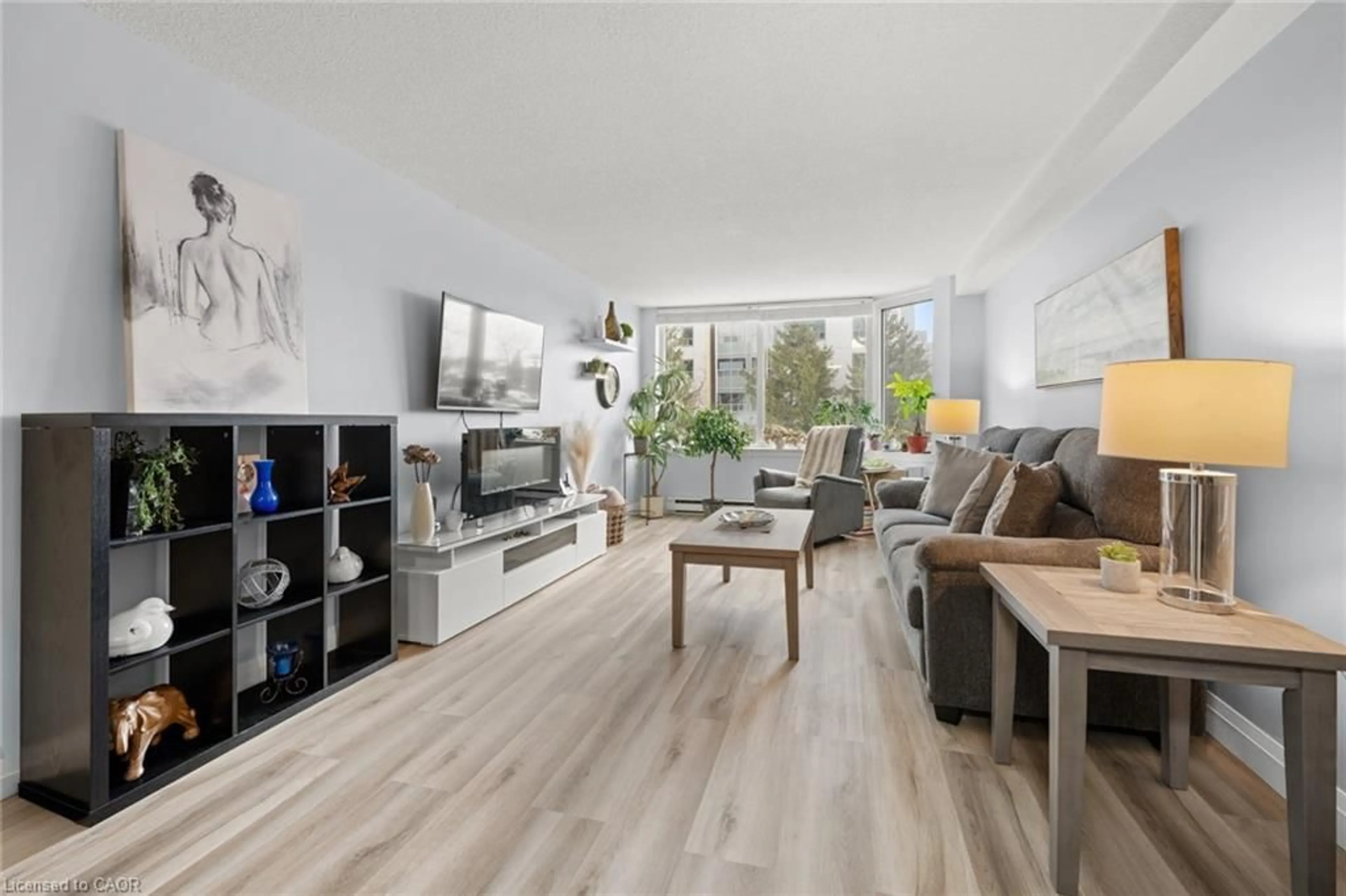 Living room with furniture, unknown for 35 Green Valley Dr #204, Kitchener Ontario N2P 2A5