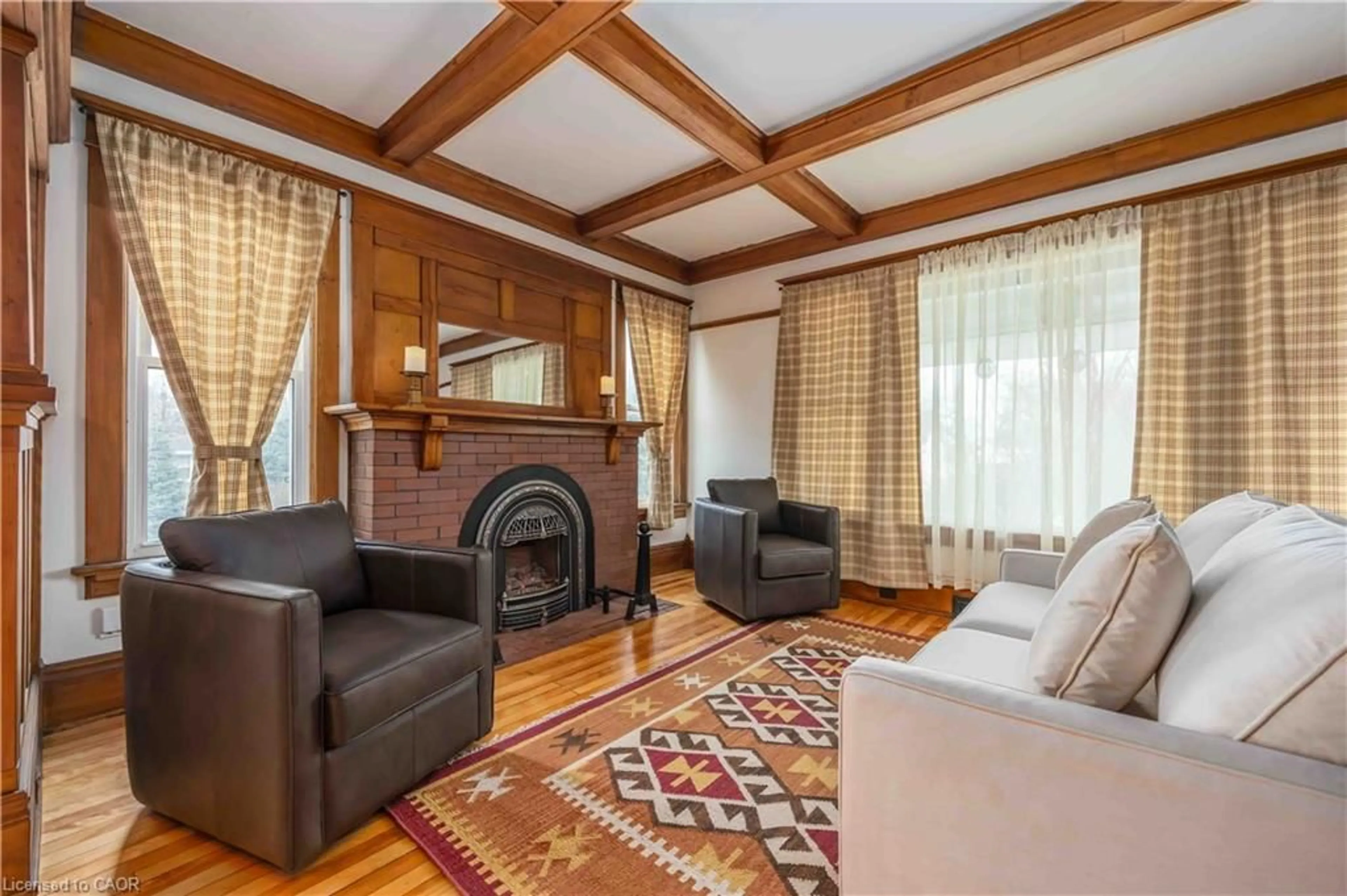 Living room with furniture, wood/laminate floor for 343 Gillard St, Wallaceburg Ontario N8A 1N5