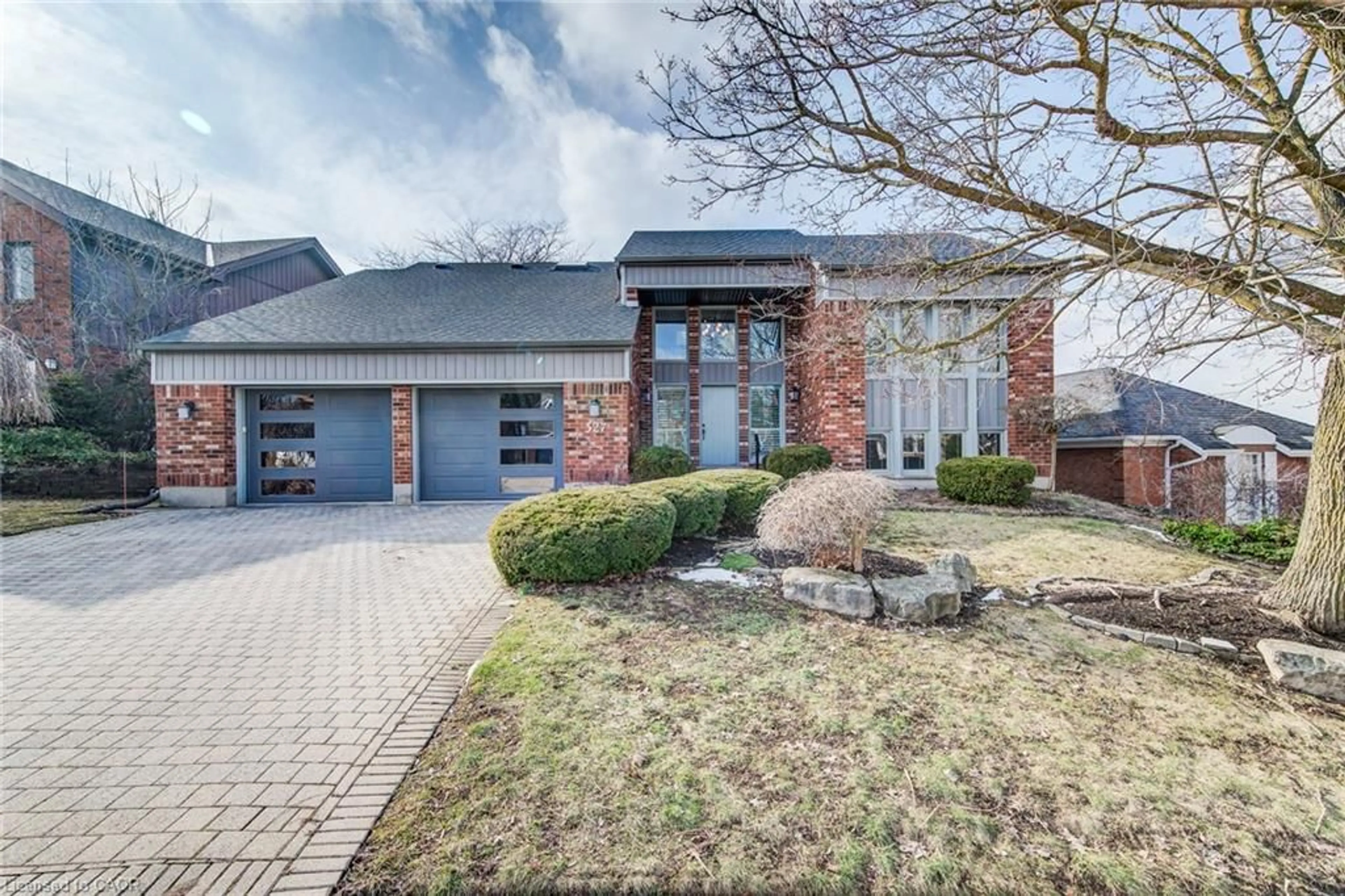 Home with brick exterior material, street for 327 Wyecroft Blvd, Waterloo Ontario N2T 2H3