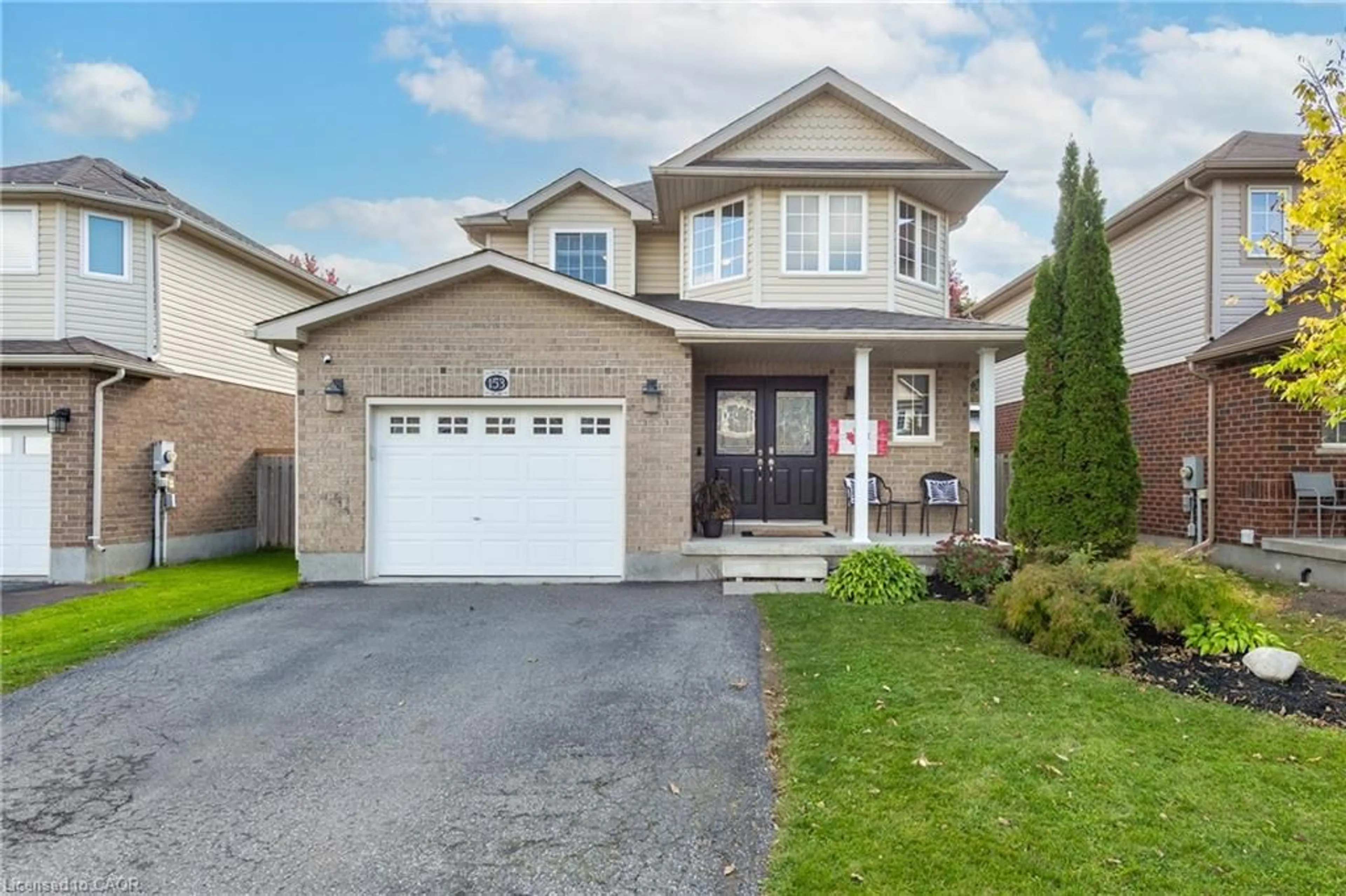 Home with brick exterior material, street for 153 Porchlight Dr, Elmira Ontario N3B 0A3