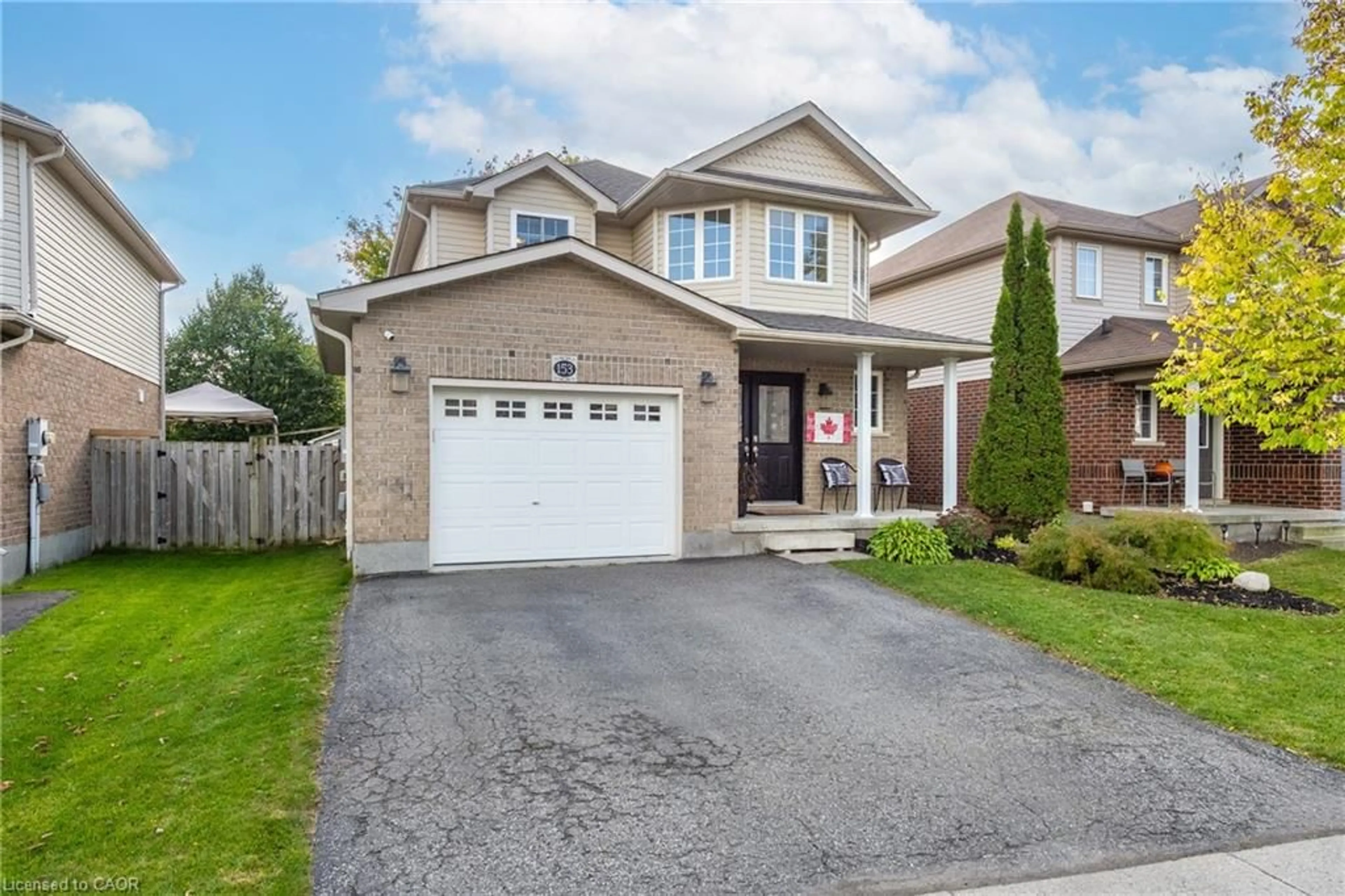 Home with brick exterior material, street for 153 Porchlight Dr, Elmira Ontario N3B 0A3