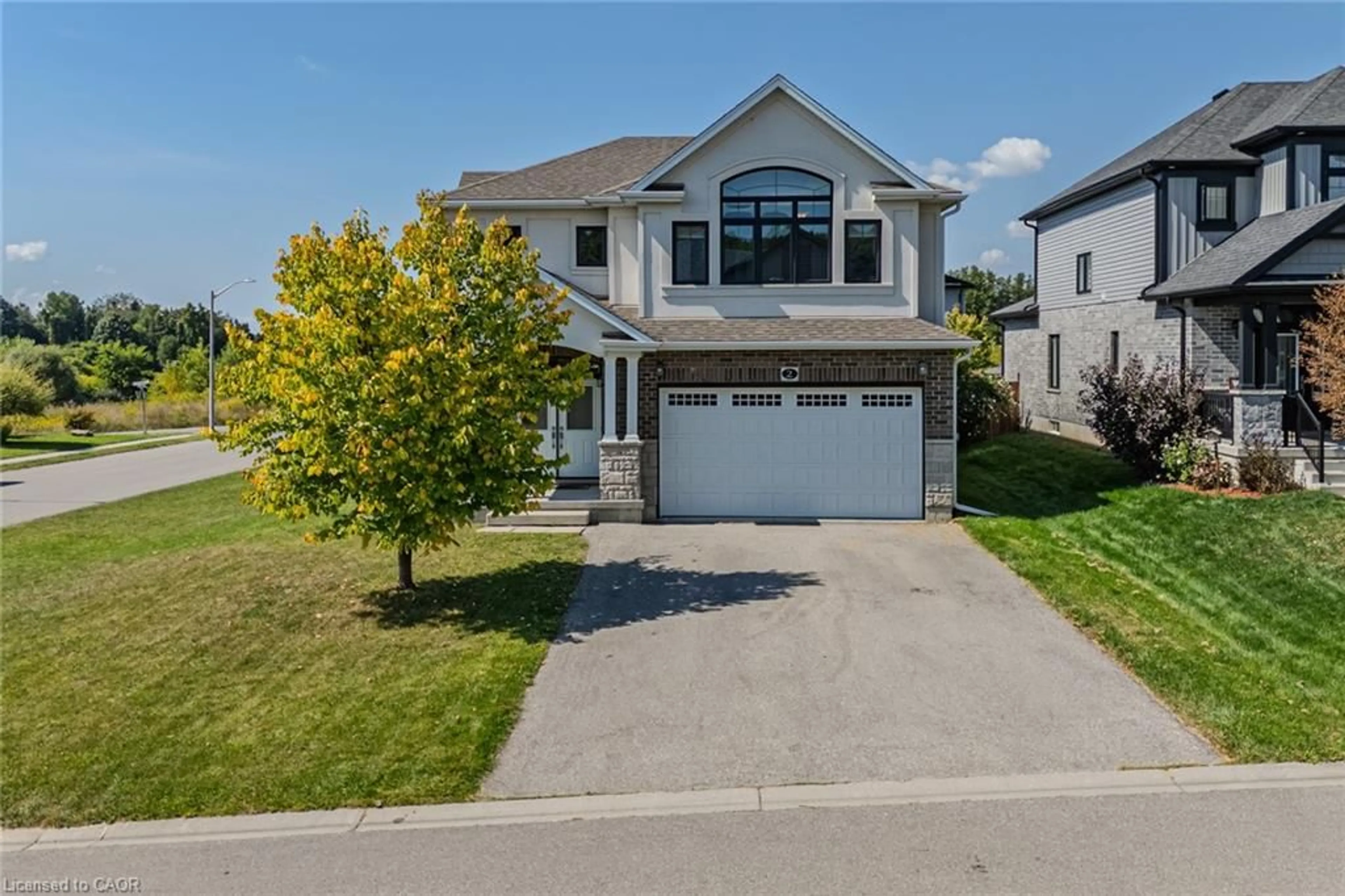 Home with vinyl exterior material, street for 2 Sedge Ave, Simcoe Ontario N3Y 0E1