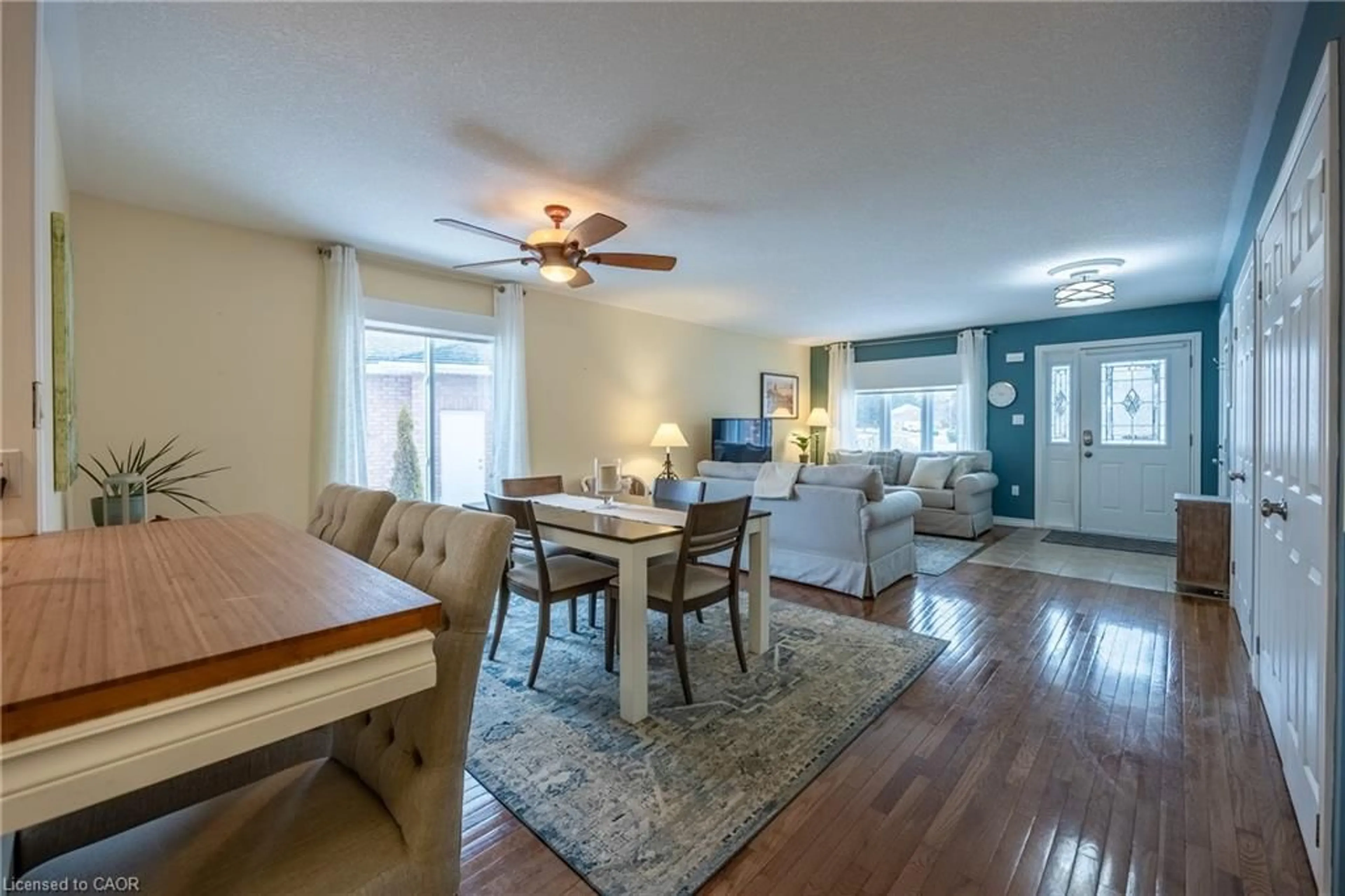 Living room with furniture, wood/laminate floor for 52 Backus Dr, Port Rowan Ontario N0E 1M0