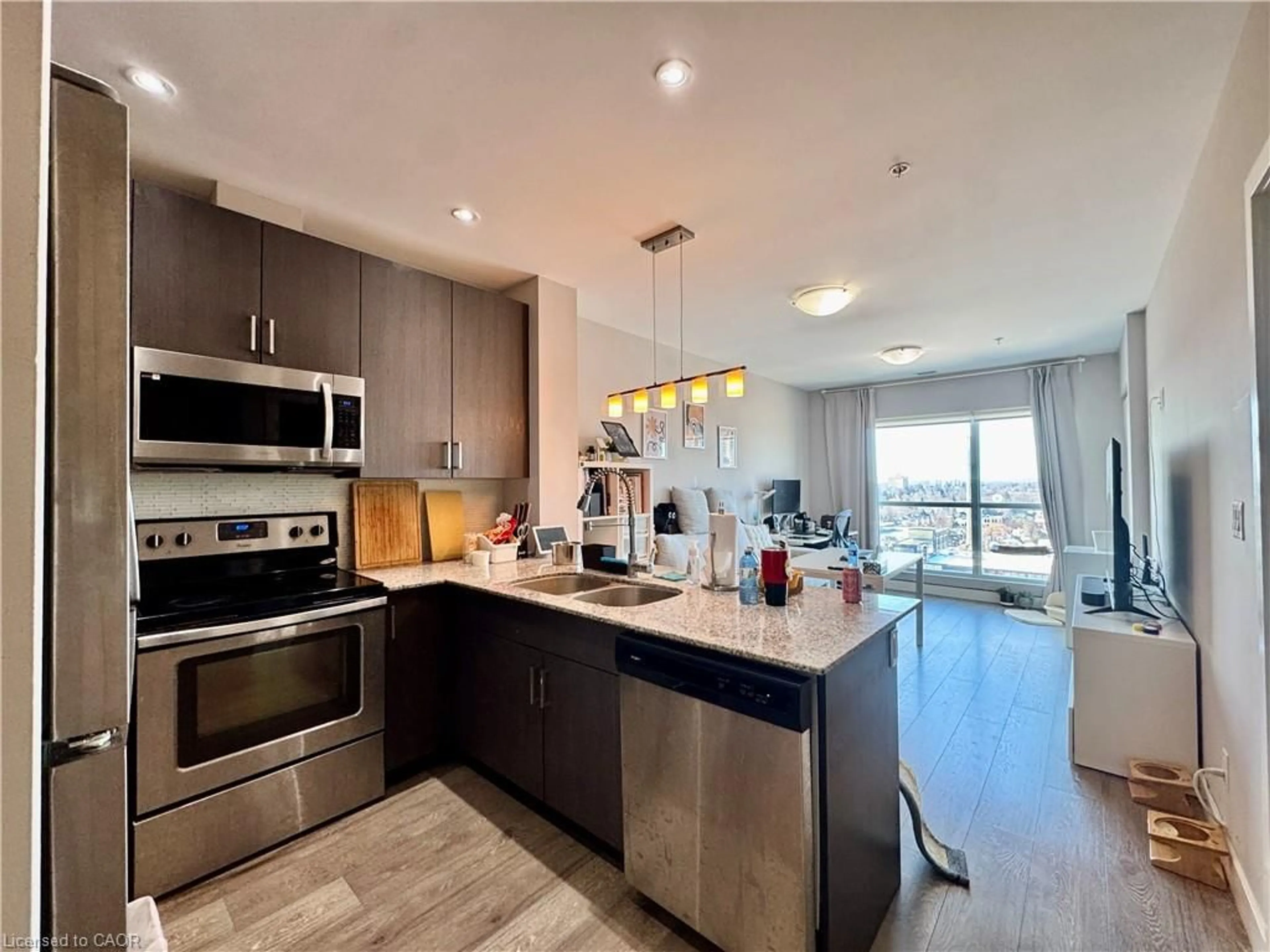 Open concept kitchen, unknown for 1 Victoria St #1007, Kitchener Ontario N2G 0B5