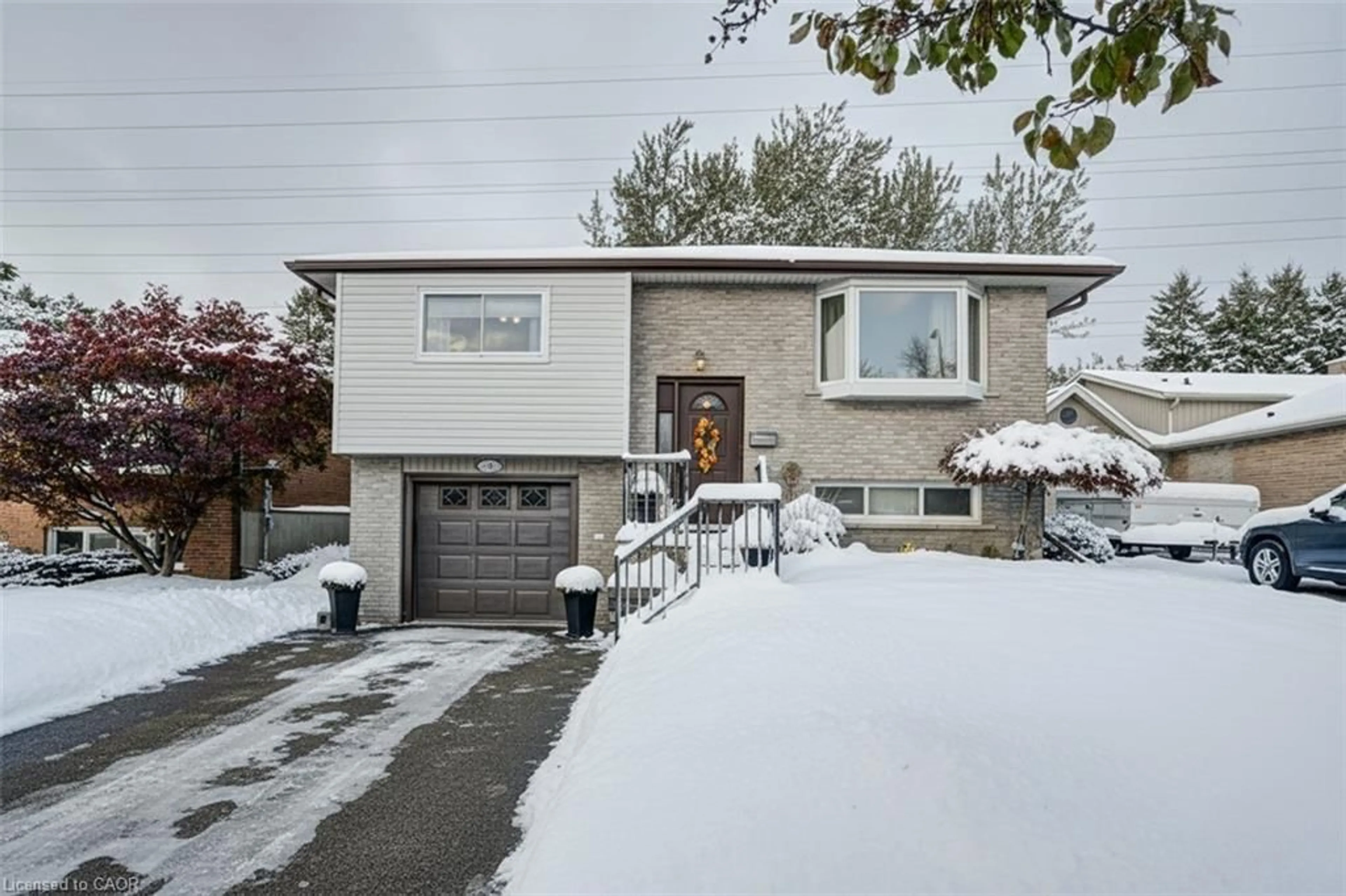 Home with brick exterior material, street for 34 Willow Green Crt, Kitchener Ontario N2N 1W6