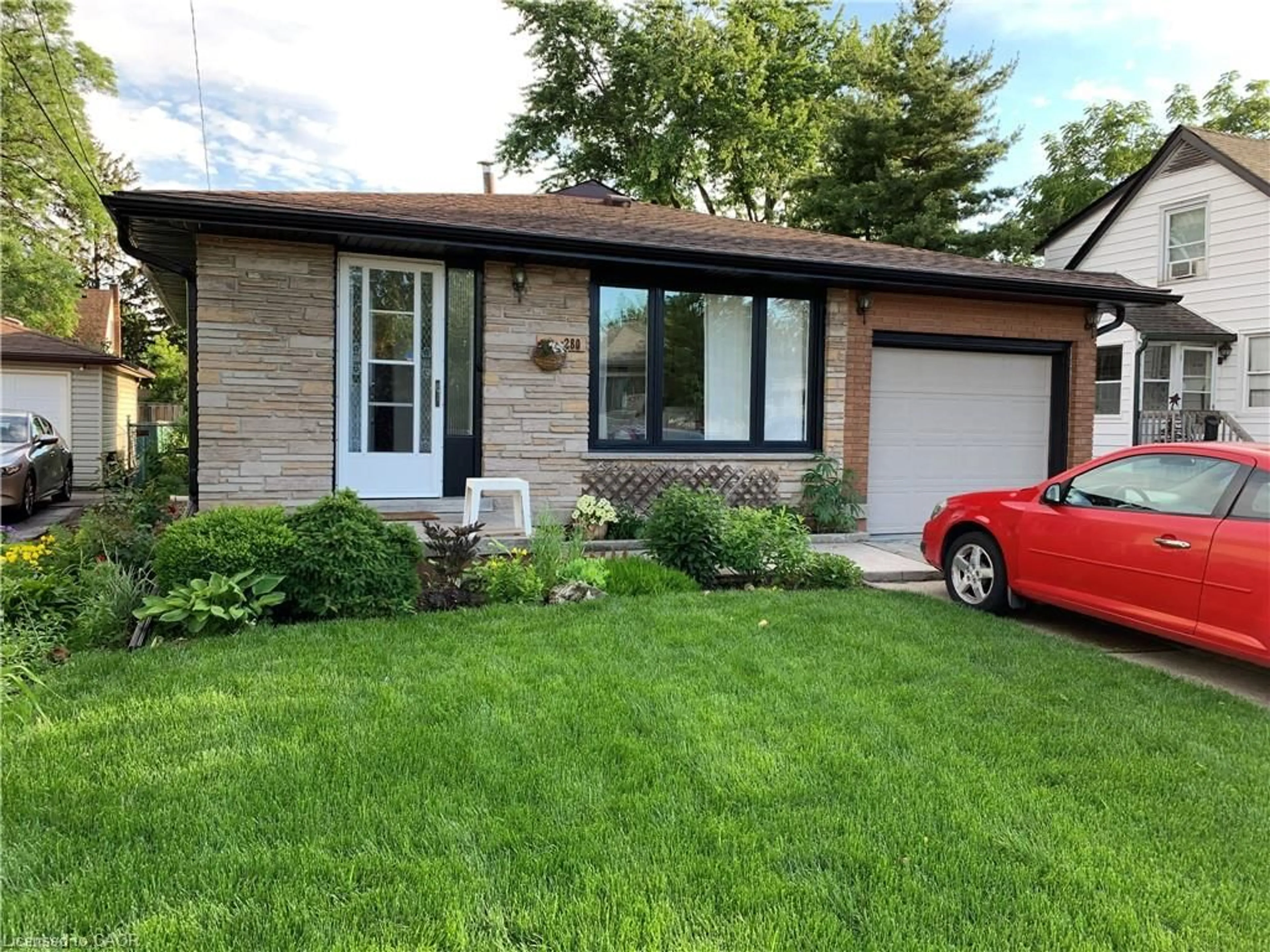 Home with brick exterior material, street for 280 Thayer Ave, Hamilton Ontario L9A 1J7