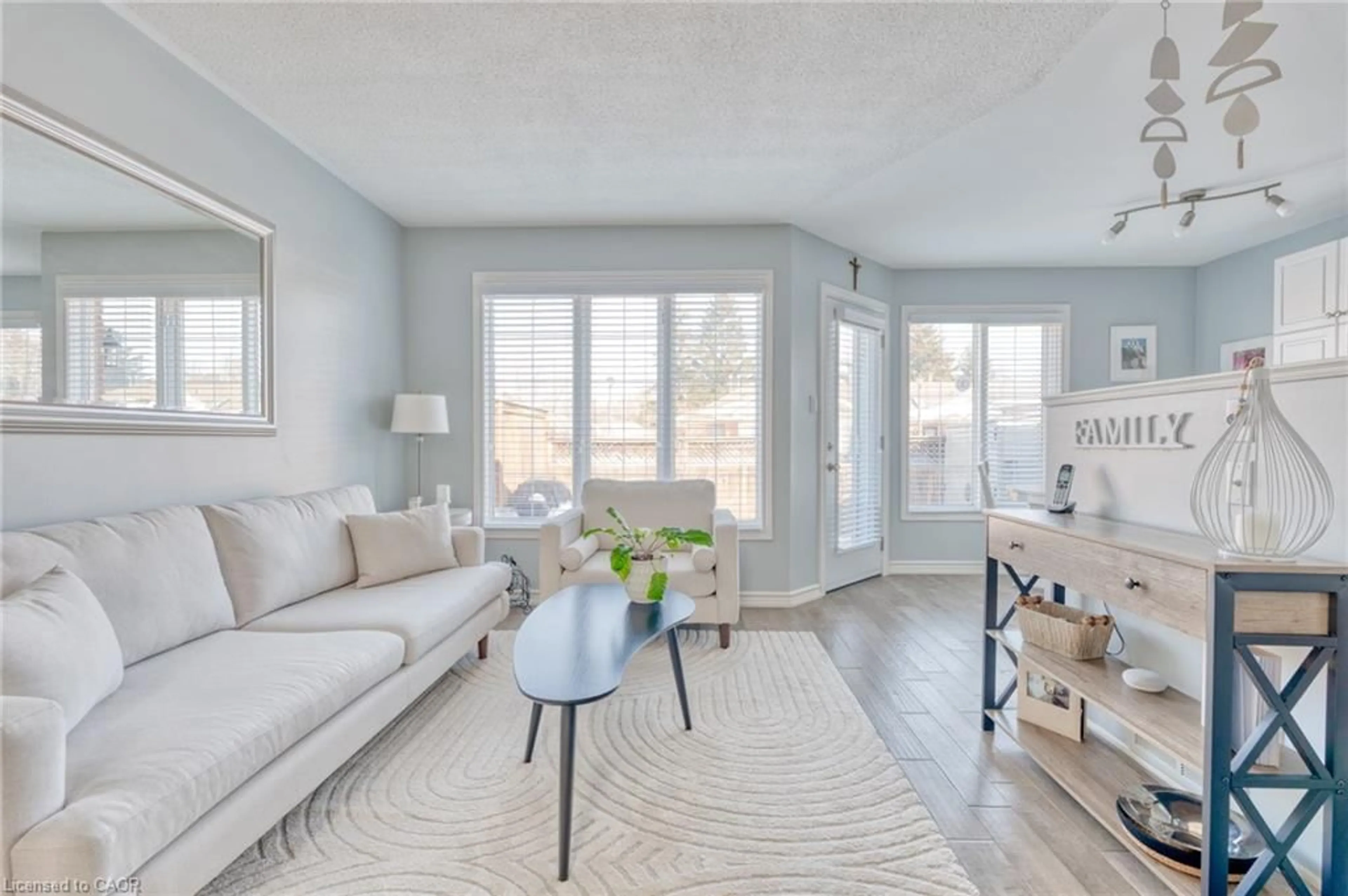 Living room with furniture, unknown for 175 Fiddlers Green Rd #3, Ancaster Ontario L9G 4X7