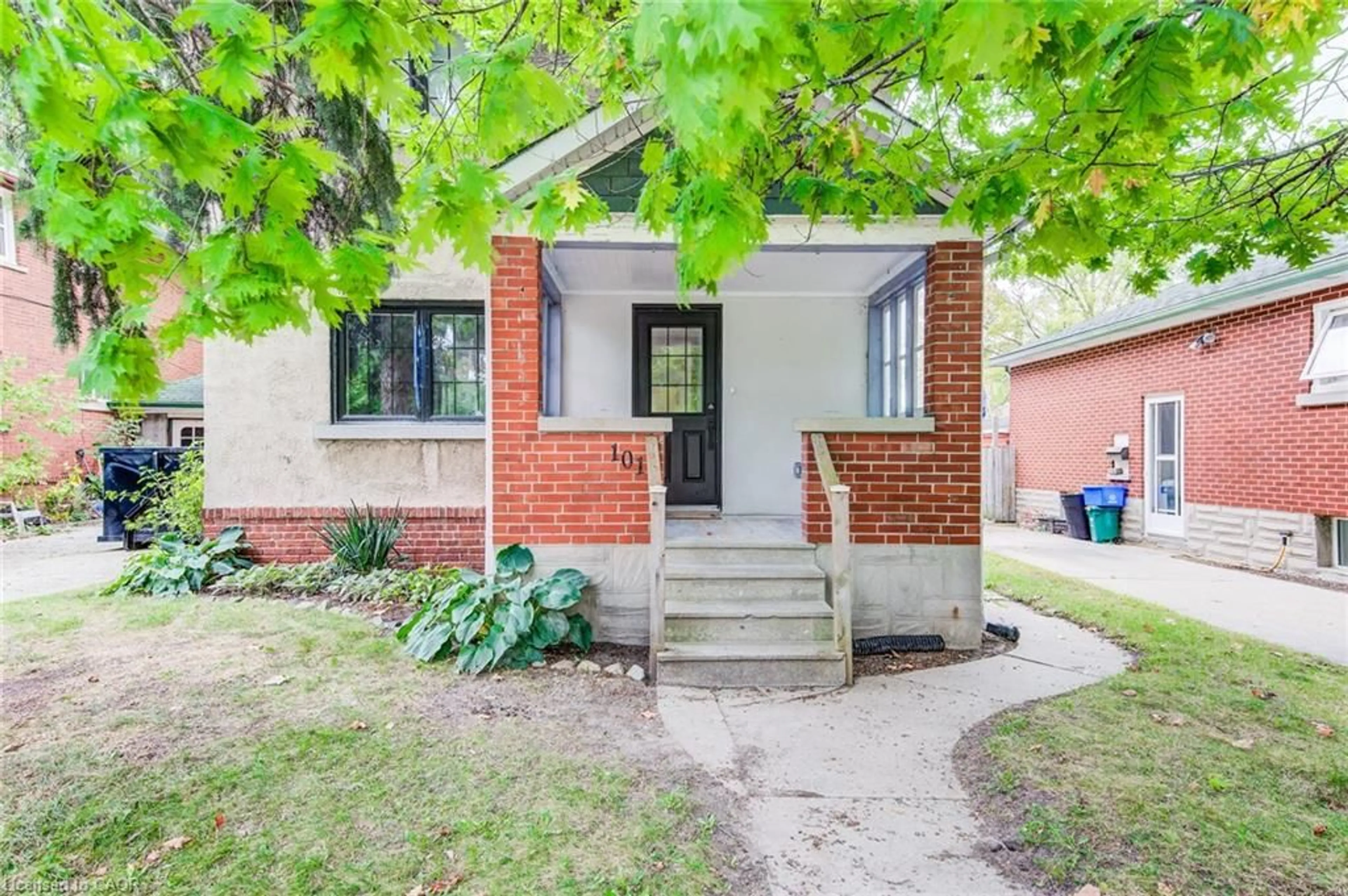 Home with brick exterior material, street for 101 Wood St, Kitchener Ontario N2G 2H9