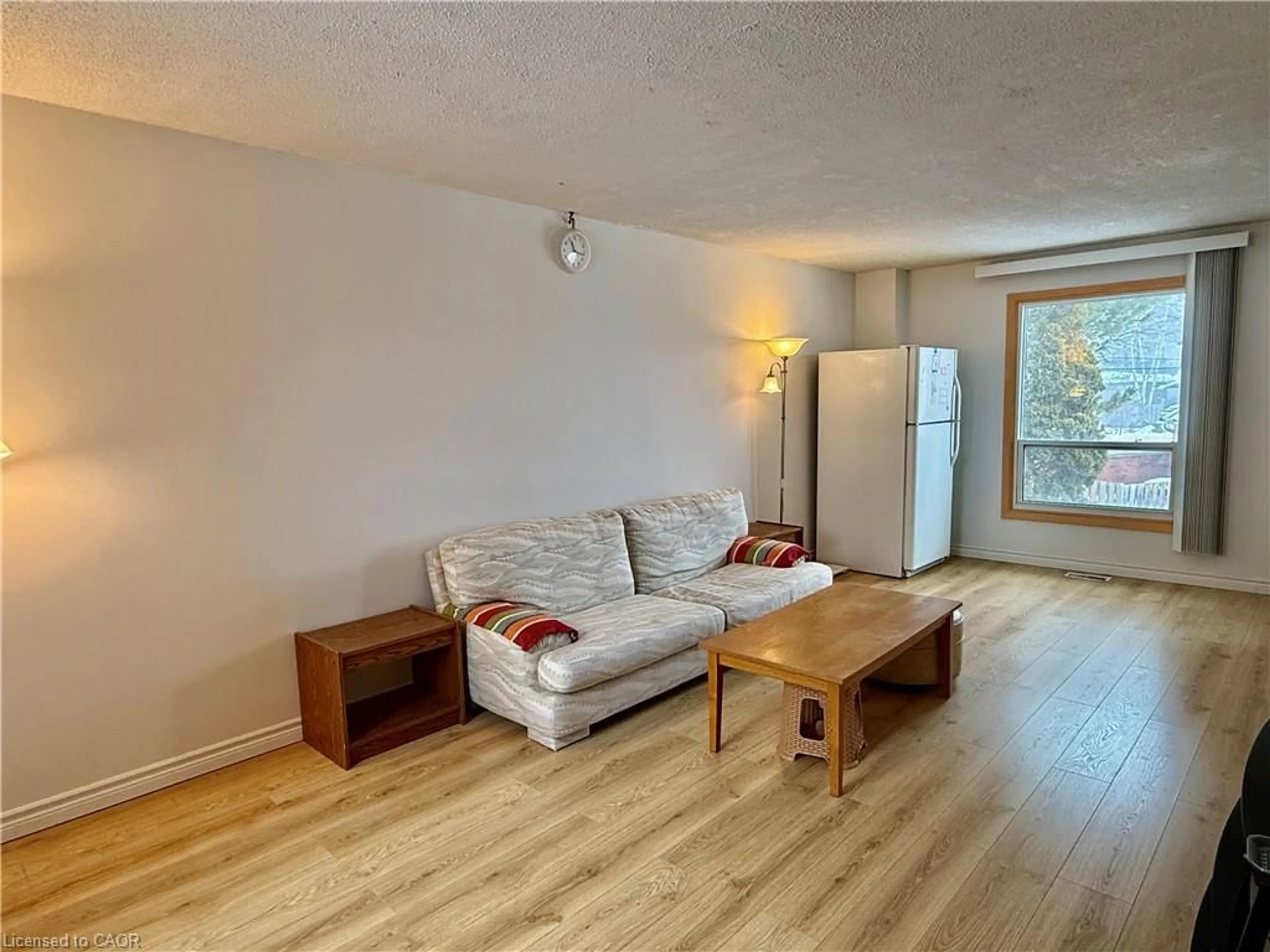 Living room with furniture, wood/laminate floor for 427 Keats Way #2, Waterloo Ontario N2L 5S7