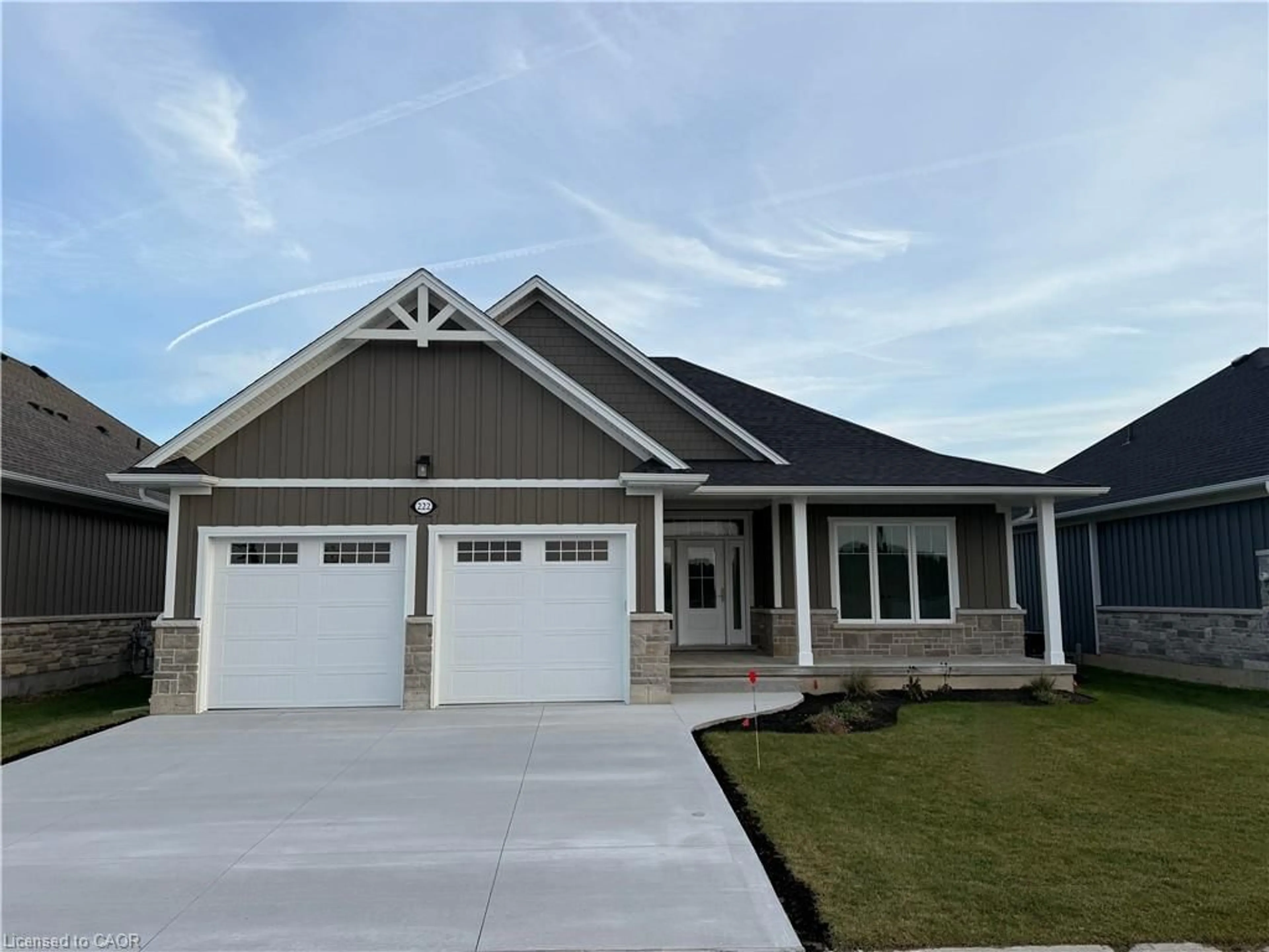 Home with vinyl exterior material, street for 222 Schooner Dr, Port Dover Ontario N0A 1N3