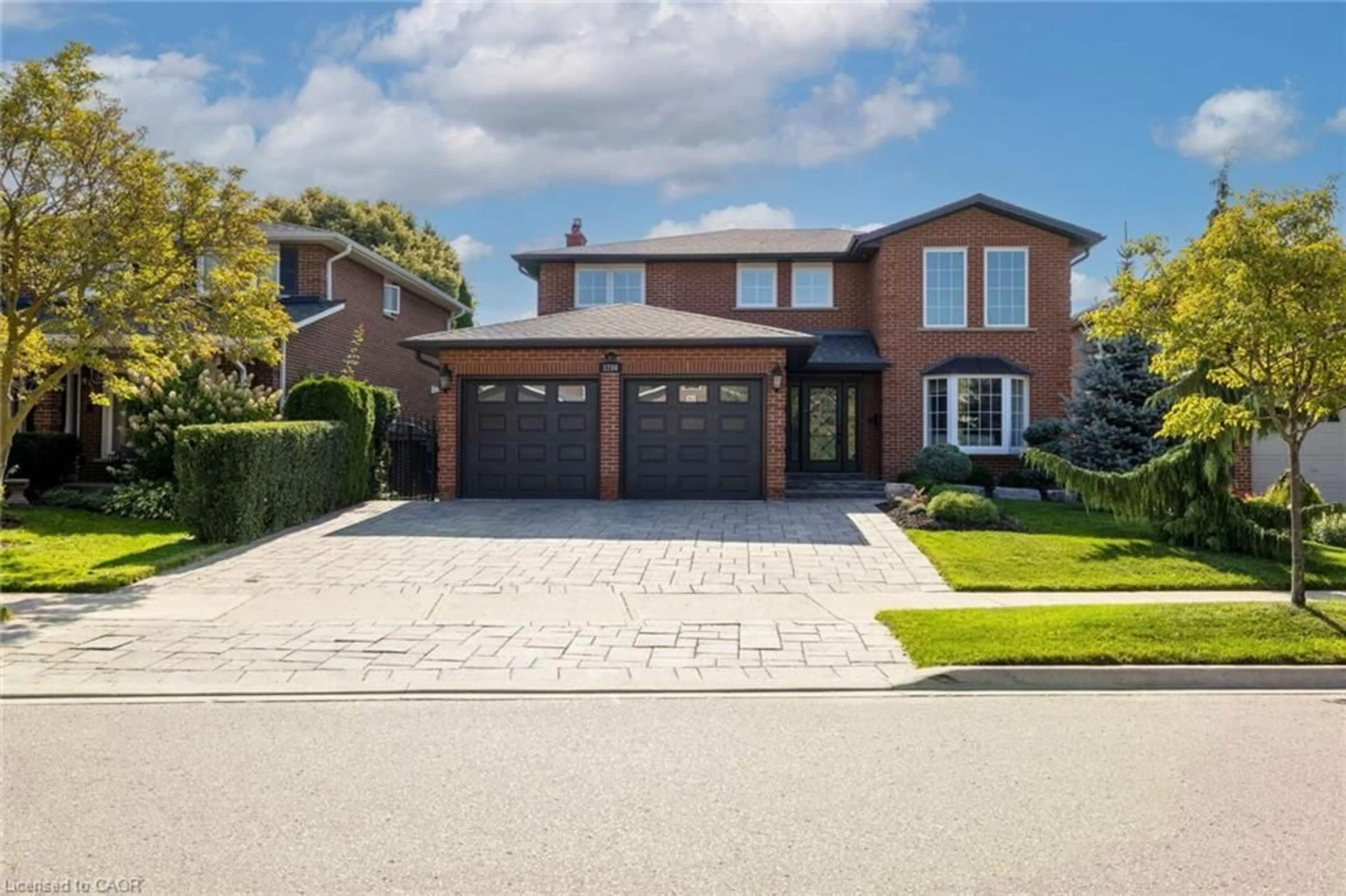 Home with brick exterior material, street for 1286 Gryphon Mews, Mississauga Ontario L4W 3E5