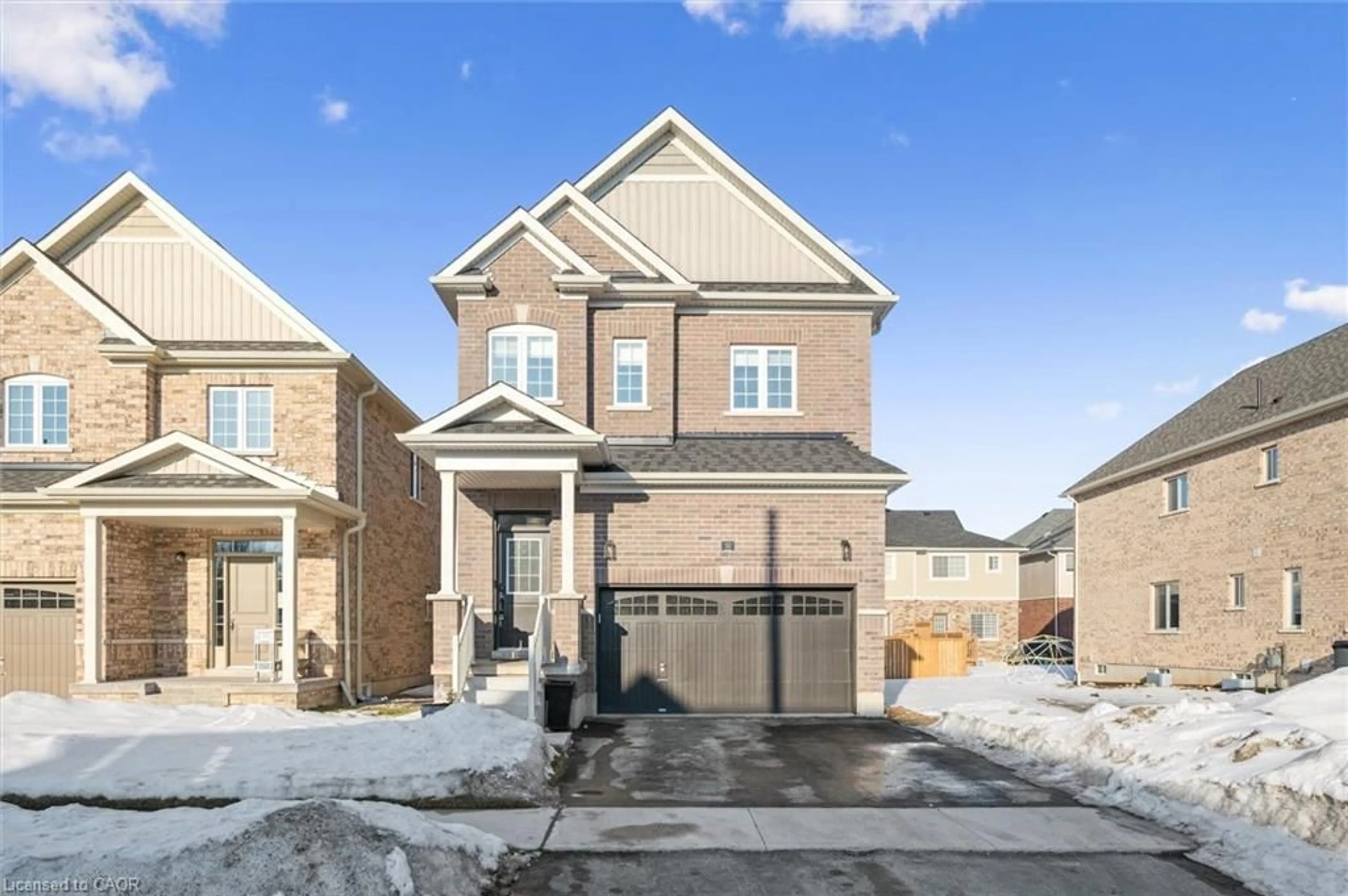 Home with brick exterior material, street for 32 Hutchison Rd, Guelph Ontario N1L 0R4